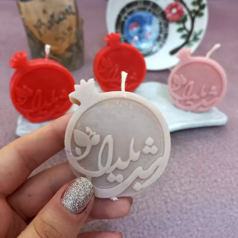 شمع شب یلدا مدل انار رنگ صورتی