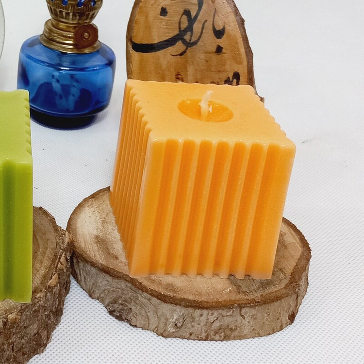 شمع مکعب کلاسیک طرح باران نارنجی 7سانتی