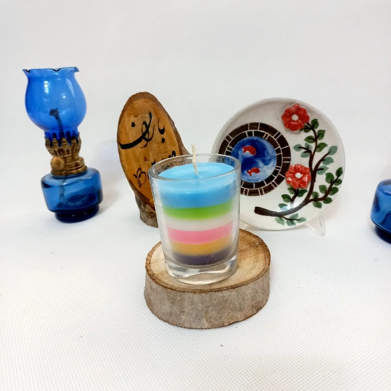 شمع لیوانی عطری رنگین کمانی در رایحه دلخواه شما