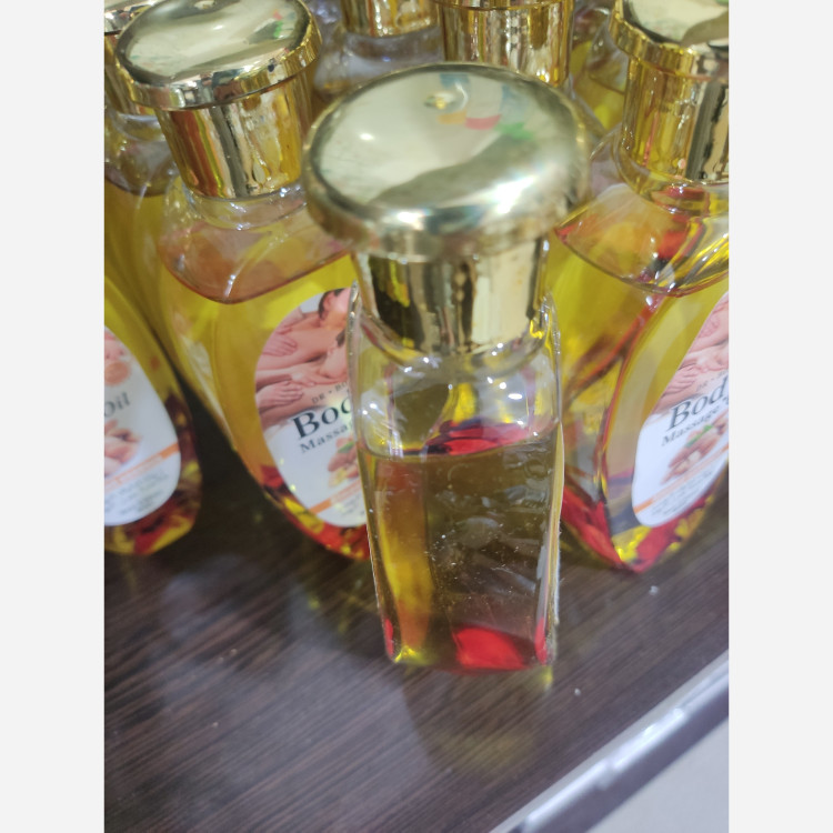 روغن ماساژ تقویتی و درمانی دکتر بوجای حجم 230 میل با عصاره روغن بادام