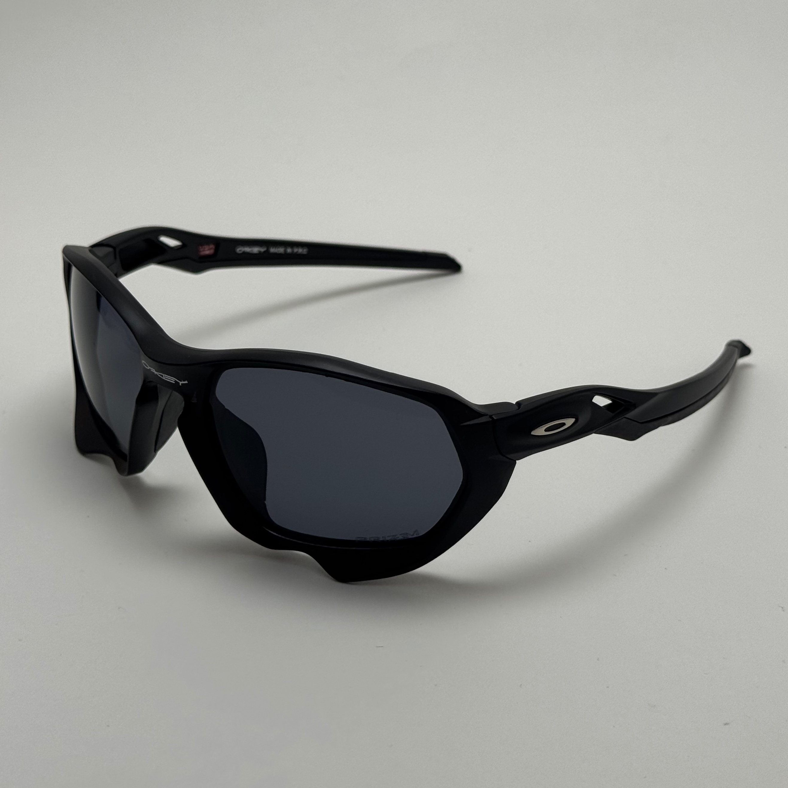 عینک آفتابی اسپرت اوکلی Oakley مدل 9019 تمام مشکی - دارای تکنولوژی پرایزم اوکلی