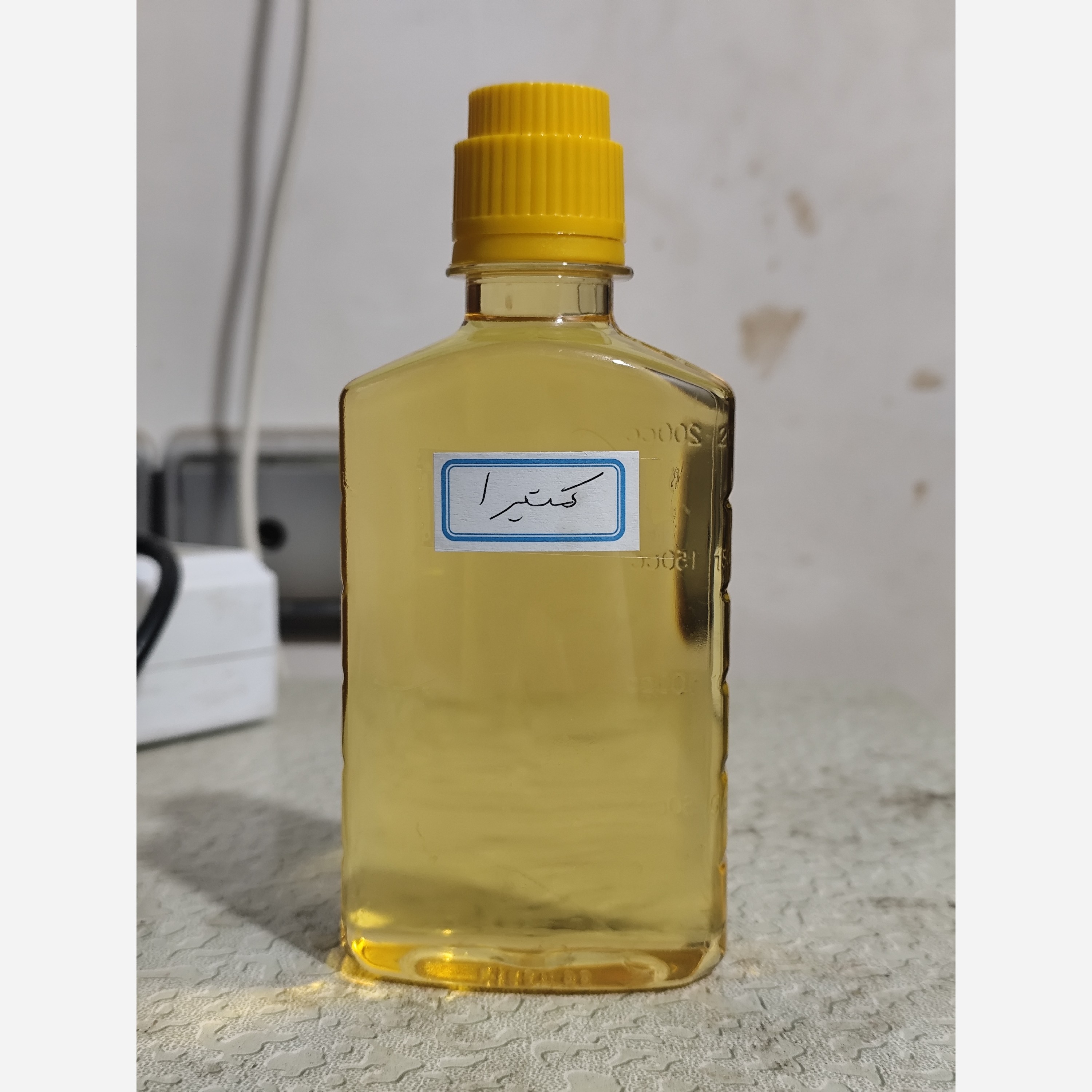 روغن کتیرا خالص ربع لیتری (رفع شوره سر ترمیم موها نرم کننده و حالت دهنده مو)