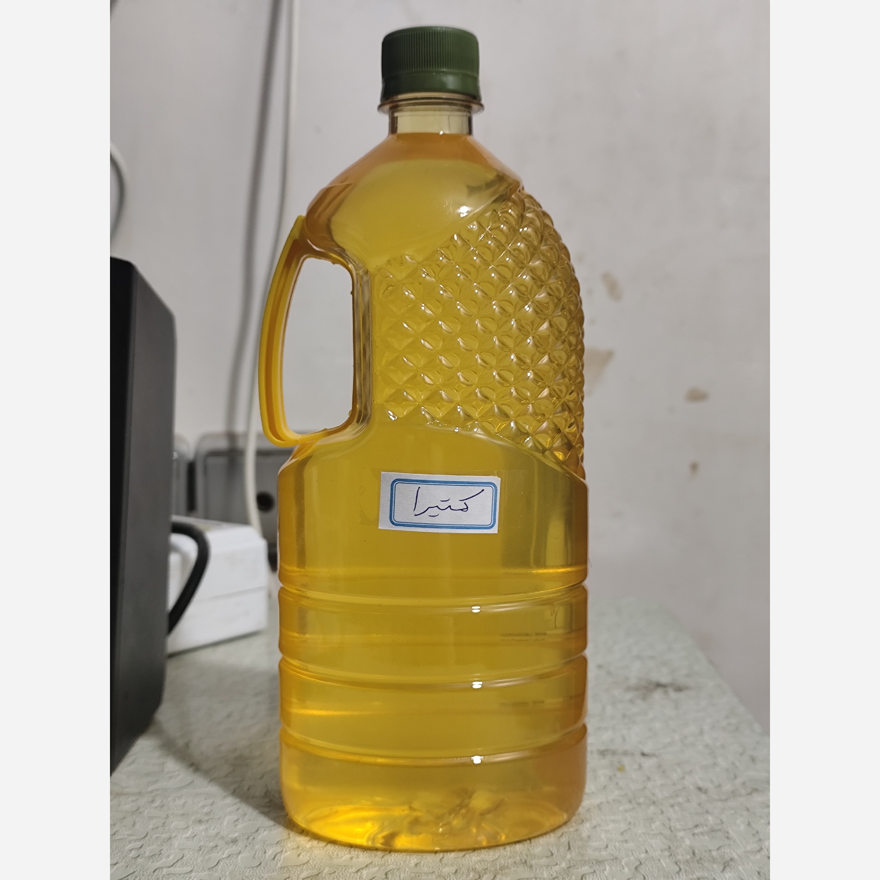 روغن کتیرا خالص نیم لیتری (رفع شوره سر ترمیم موها نرم کننده و حالت دهنده مو)