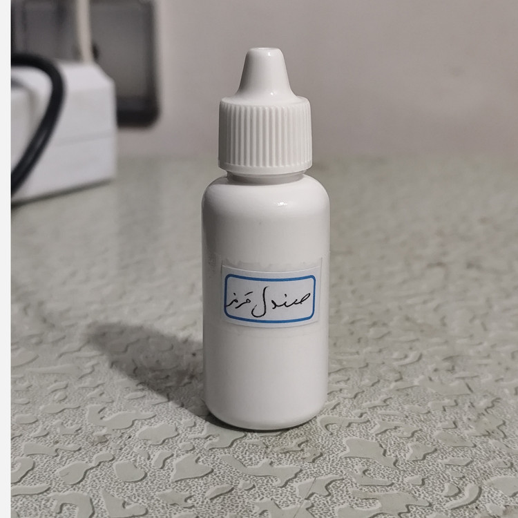 روغن چوب صندل قرمز (آکنه-لک صورت-جوش صورت-جای جوش لکه های قهوه ای-ضدلک-پرپشت کننده مو-ریزش مو)