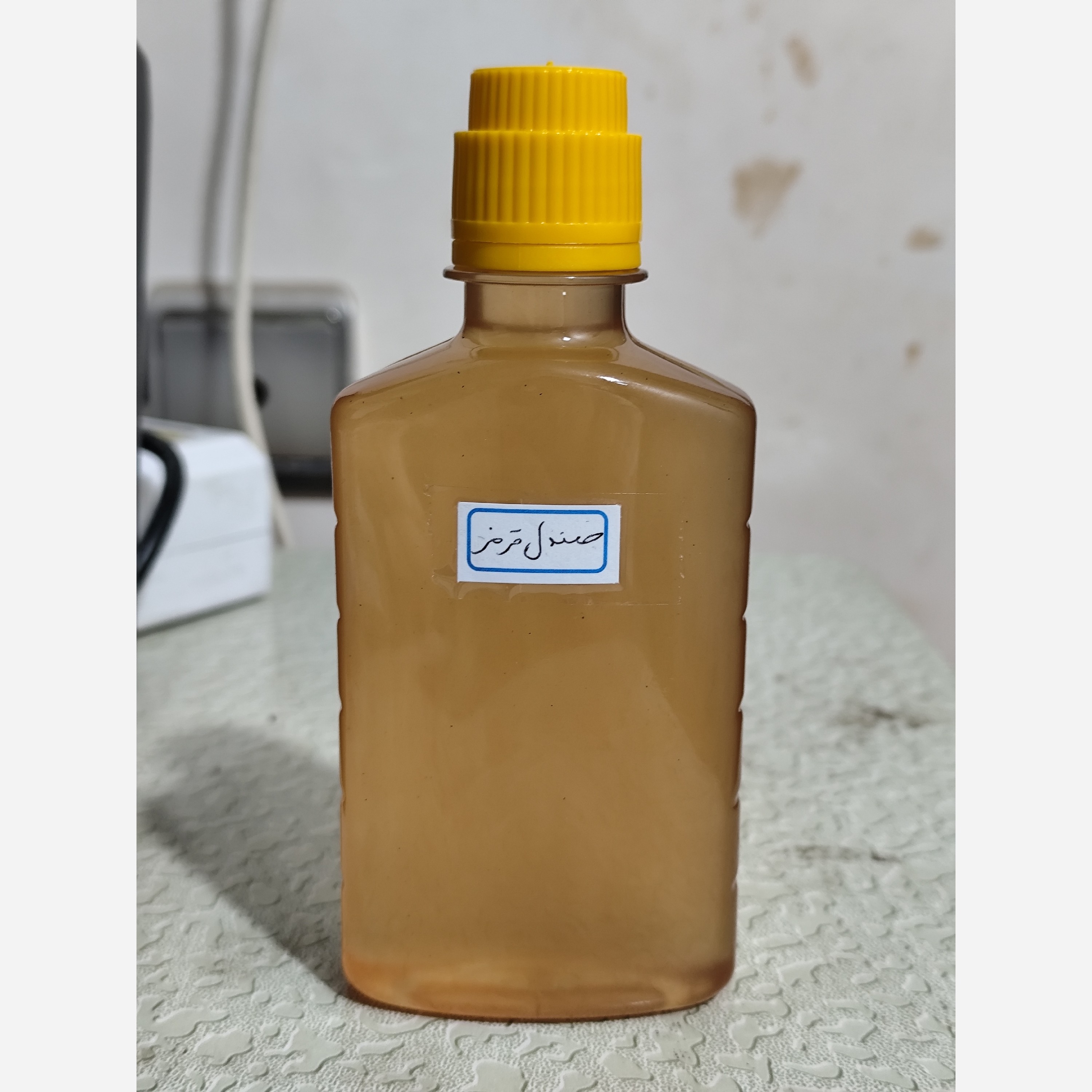 روغن چوب صندل قرمز (آکنه-لک صورت-جوش صورت-جای جوش لکه های قهوه ای-ضدلک-پرپشت کننده مو-ریزش مو) ربع لیتری