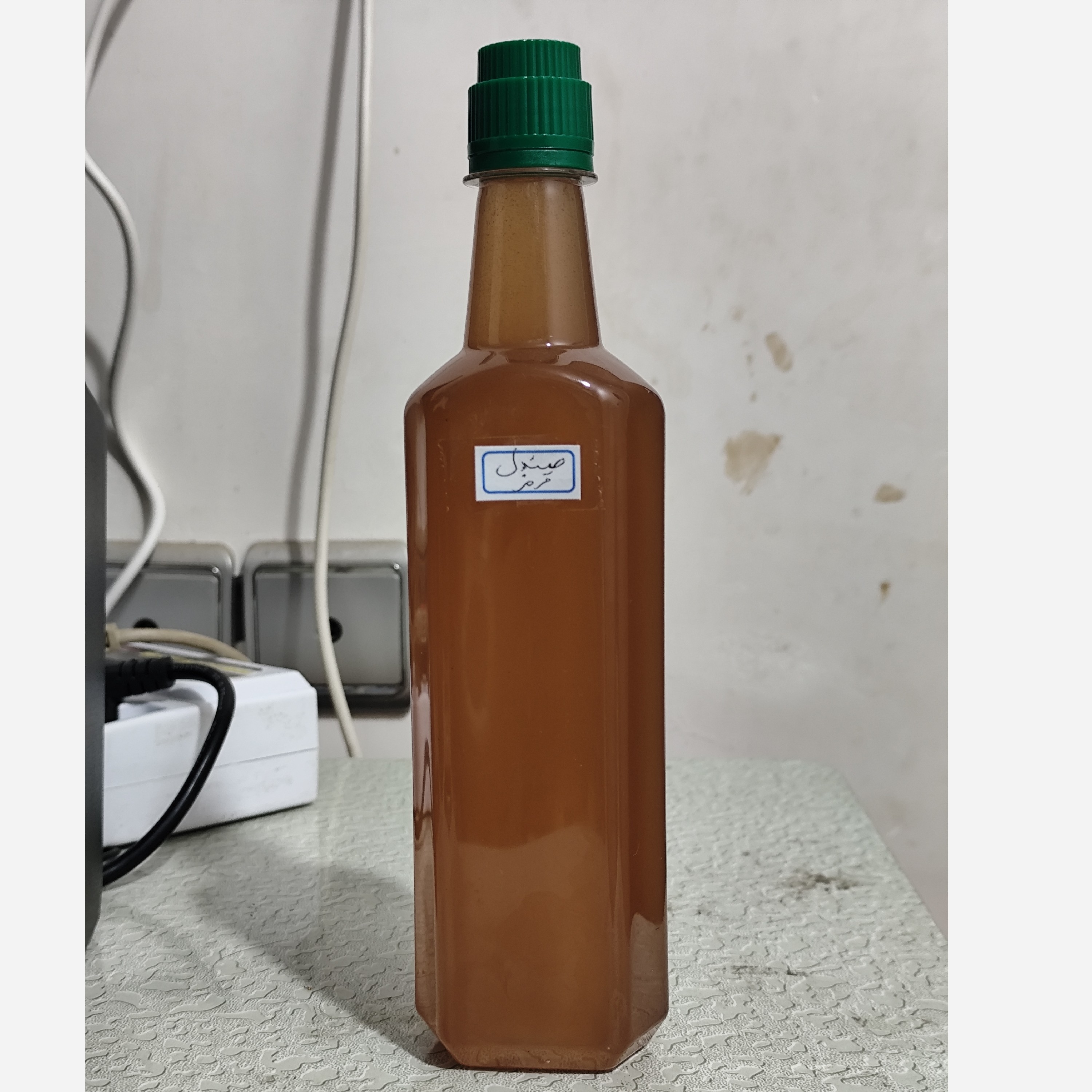 روغن چوب صندل قرمز (آکنه-لک صورت-جوش صورت-جای جوش لکه های قهوه ای-ضدلک-پرپشت کننده مو-ریزش مو) نیم لیتری