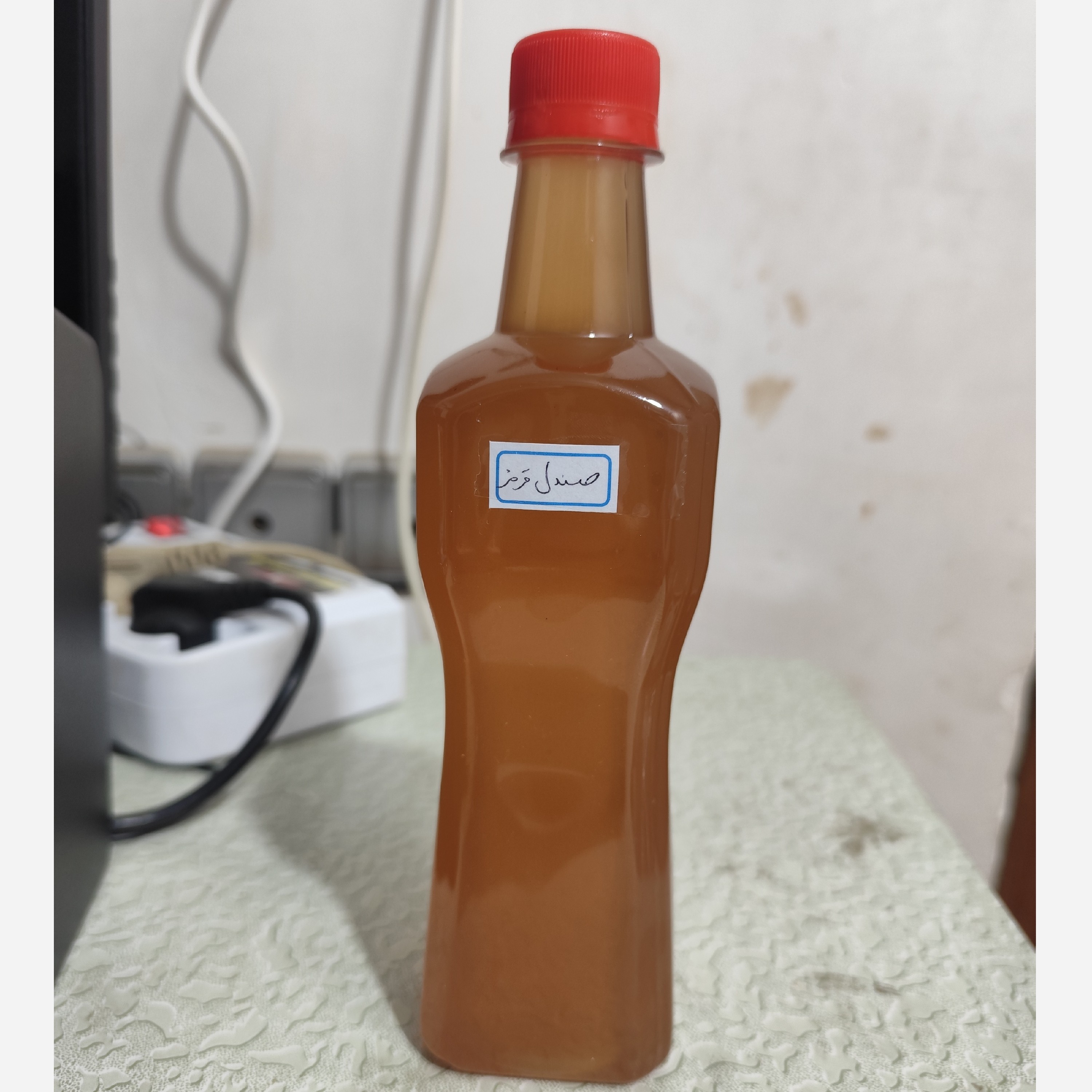 روغن چوب صندل قرمز (آکنه-لک صورت-جوش صورت-جای جوش لکه های قهوه ای-ضدلک-پرپشت کننده مو-ریزش مو) نیم لیتری