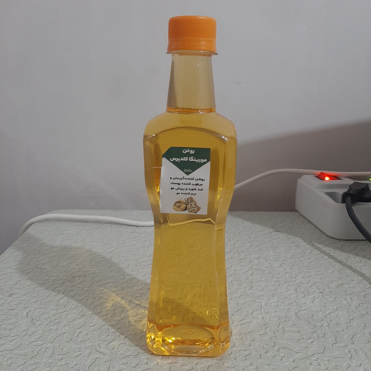 روغن مورینگا اصل بی بو بدون بو نیم لیتری کلدپرس (روشن کننده آبرسان پوست مرطوب کننده شوره مو ریزش مو نرم کننده مو )