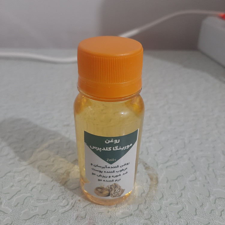 روغن مورینگا بی بو بدون بو اصل 60 میلی معطر کلدپرس (روشن کننده آبرسان پوست مرطوب کننده شوره مو ریزش مو نرم کننده مو )