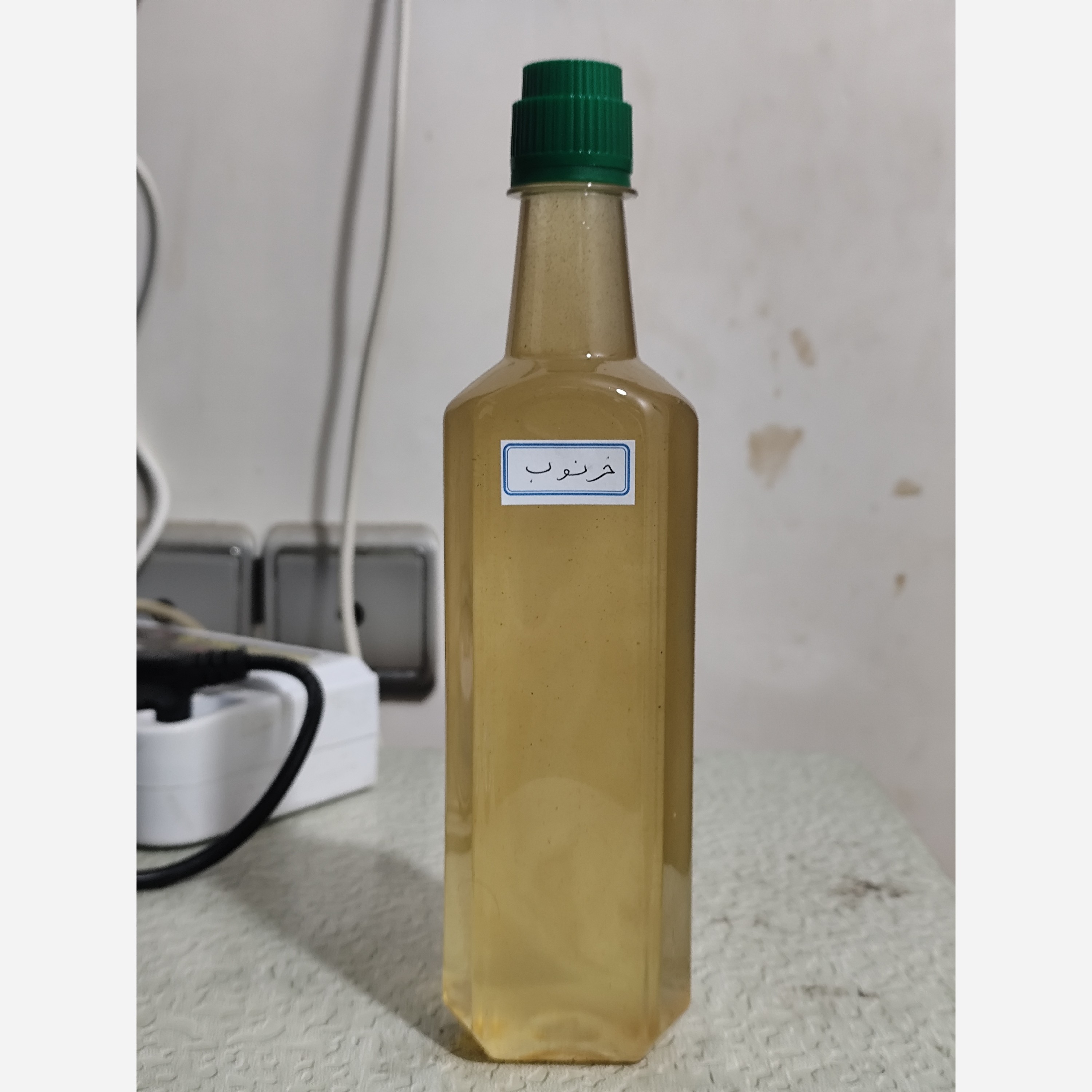 روغن خرنوب نیم لیتری