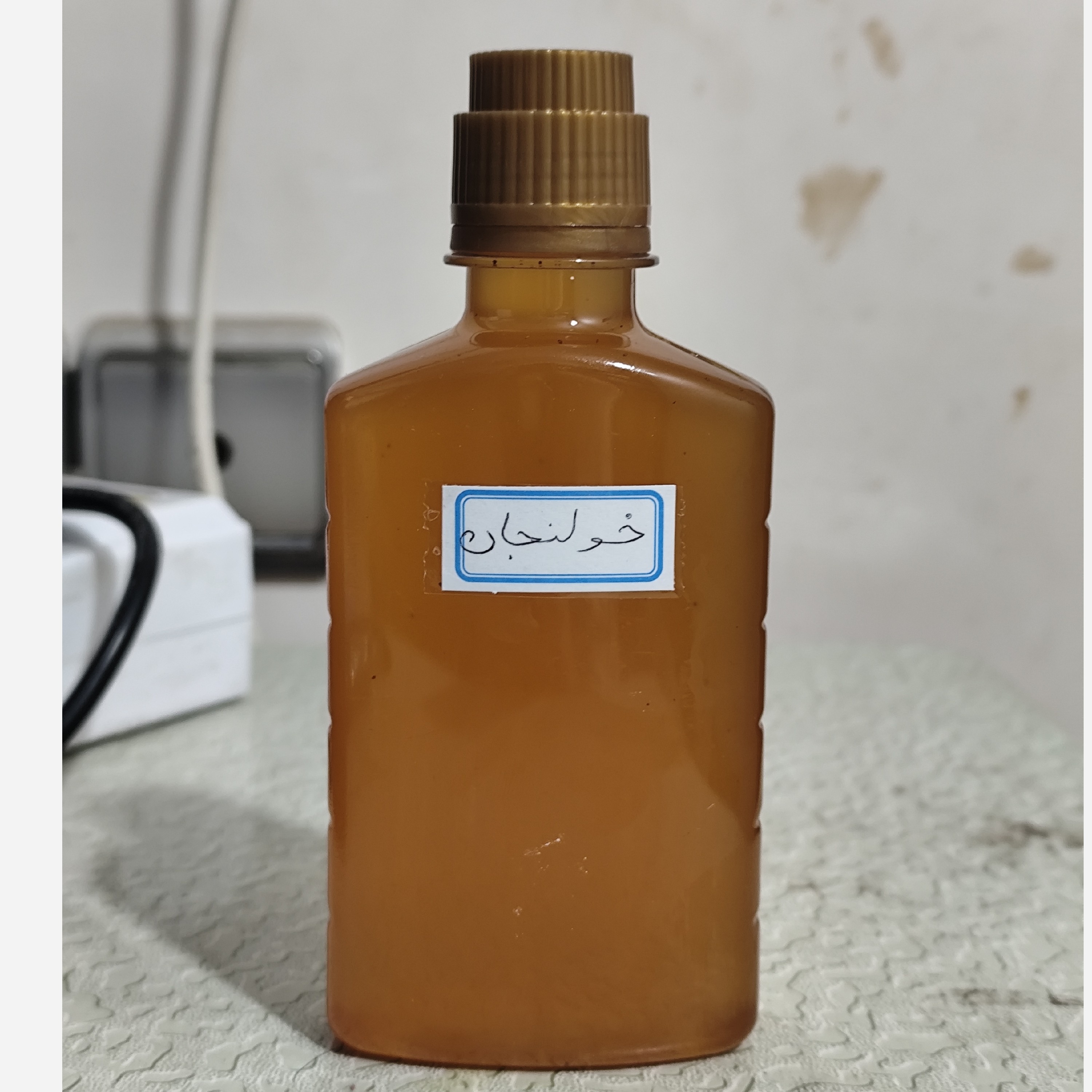 روغن خولنجان اصل و خالص ربع لیتری (پر شدن صورت کمردرد سیاتیک گردن درد دست و پا درد گرفتگی عضلات)