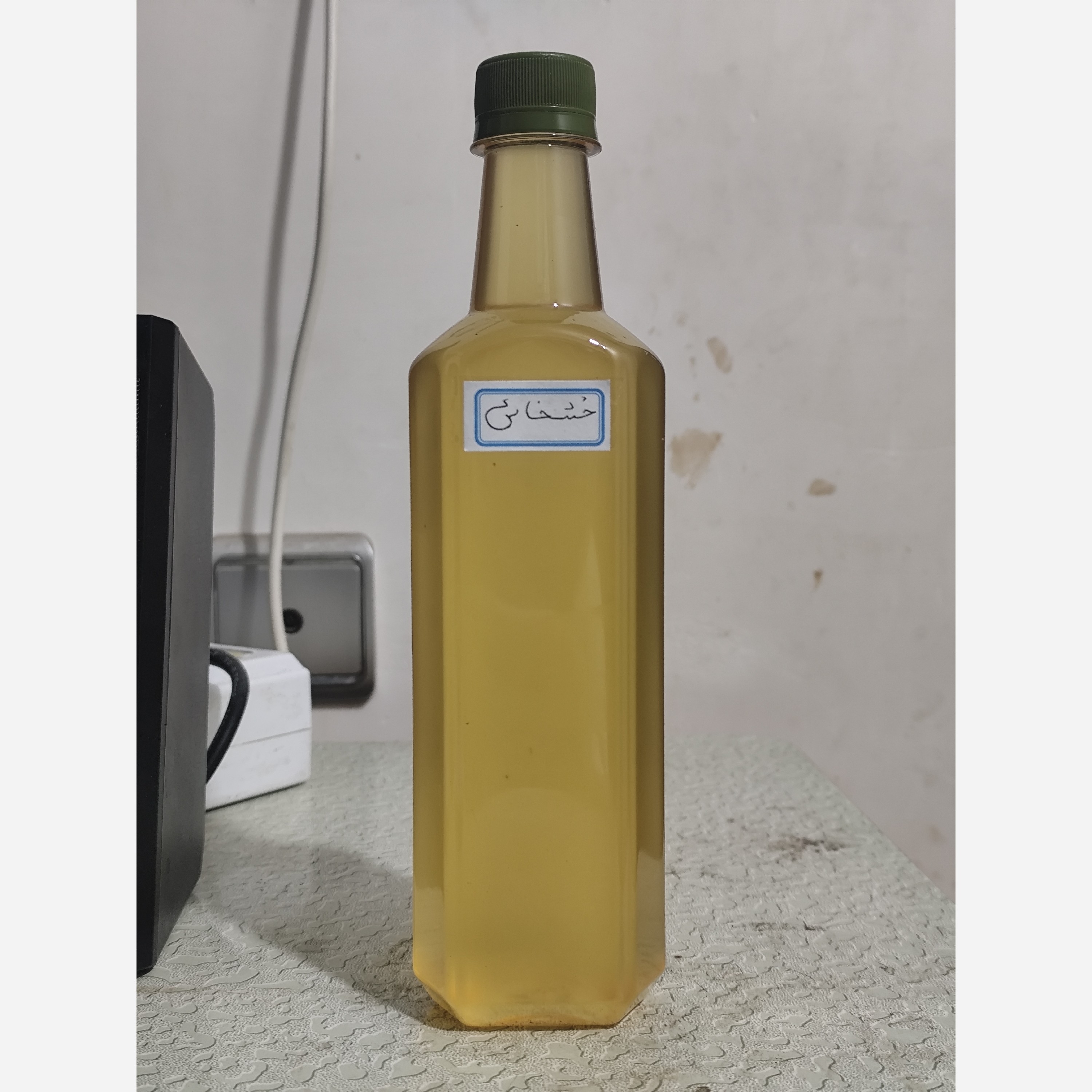 روغن خشخاش بنماری نیم لیتری (موثر در گرفتگی عضلات و تسکین دهنده)