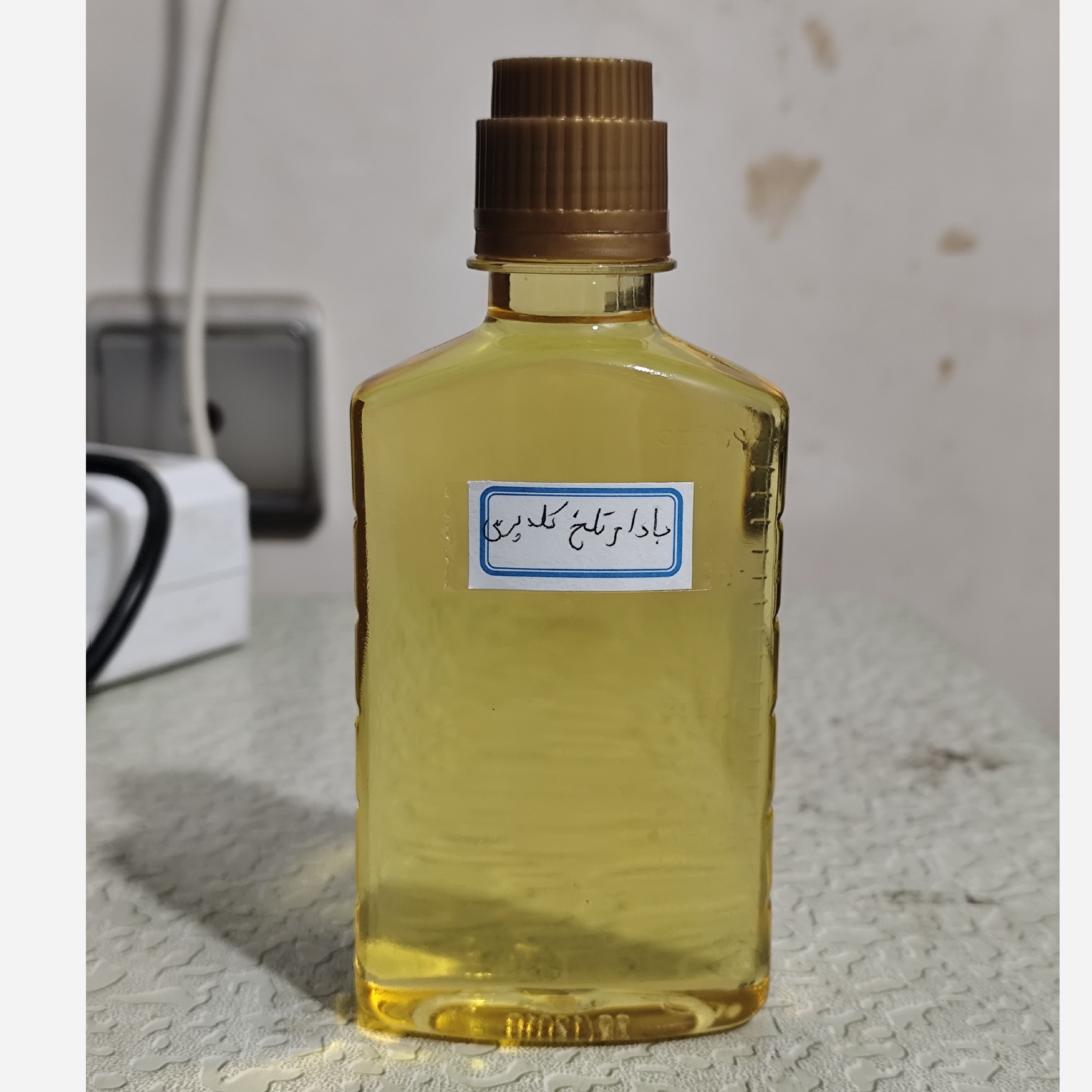 روغن بادام تلخ کلدپرس ربع لیتری اصل و خالص درجه یک (لک صورت چین و چروک اگزما آبرسان پوست شوره مو تقویت ابرو)