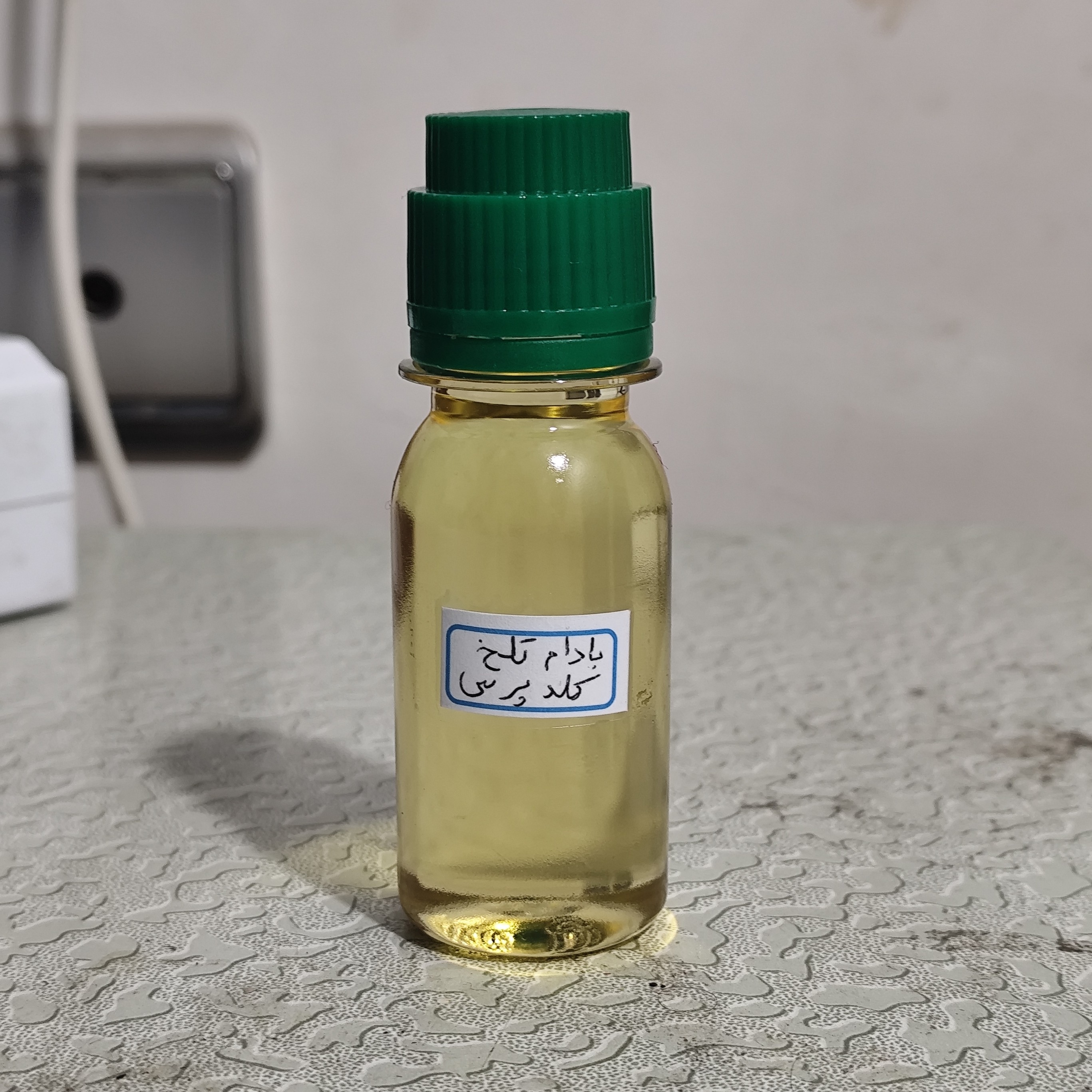 روغن بادام تلخ کلد پرس 60 سی سی درجه یک (لک صورت چین و چروک اگزما آبرسان پوست شوره مو تقویت ابرو)