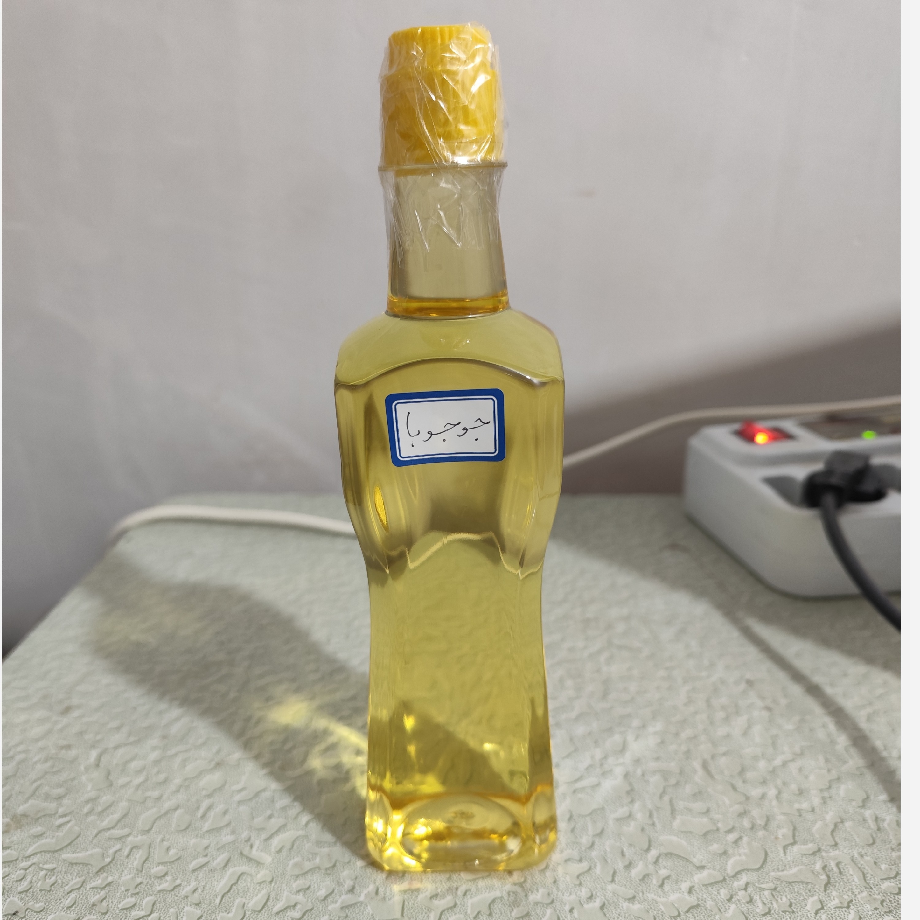 روغن جوجوبا نیم لیتری بدون بی بو اصل(چین و چروک جوش آکنه اگزما پسوریازیس خشکی لب ترک های پوستی رشد ناخن سیاهی دور چشم زگ