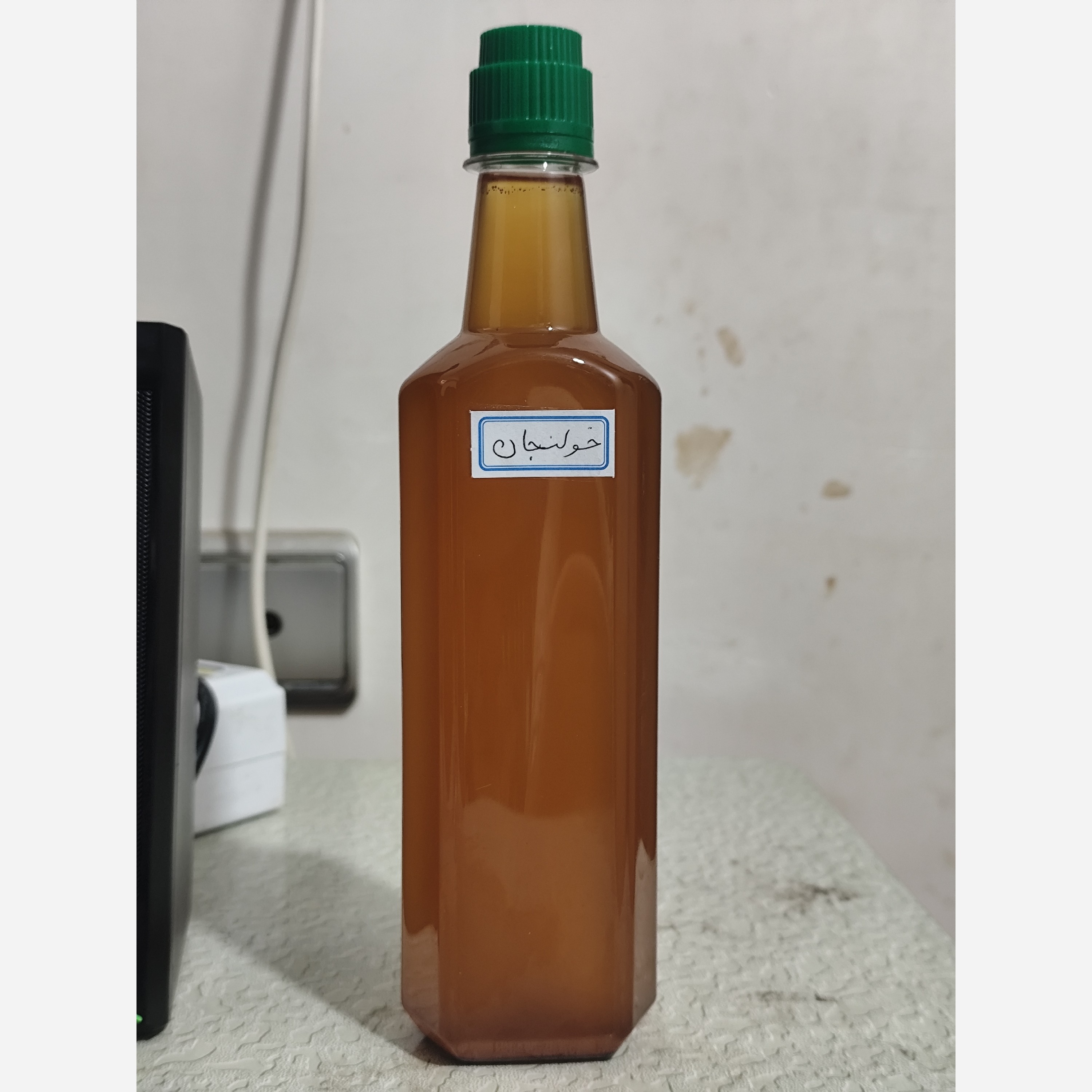 روغن خولنجان اصل و خالص نیم لیتری (پر شدن صورت کمردرد سیاتیک گردن درد دست و پا درد گرفتگی عضلات)