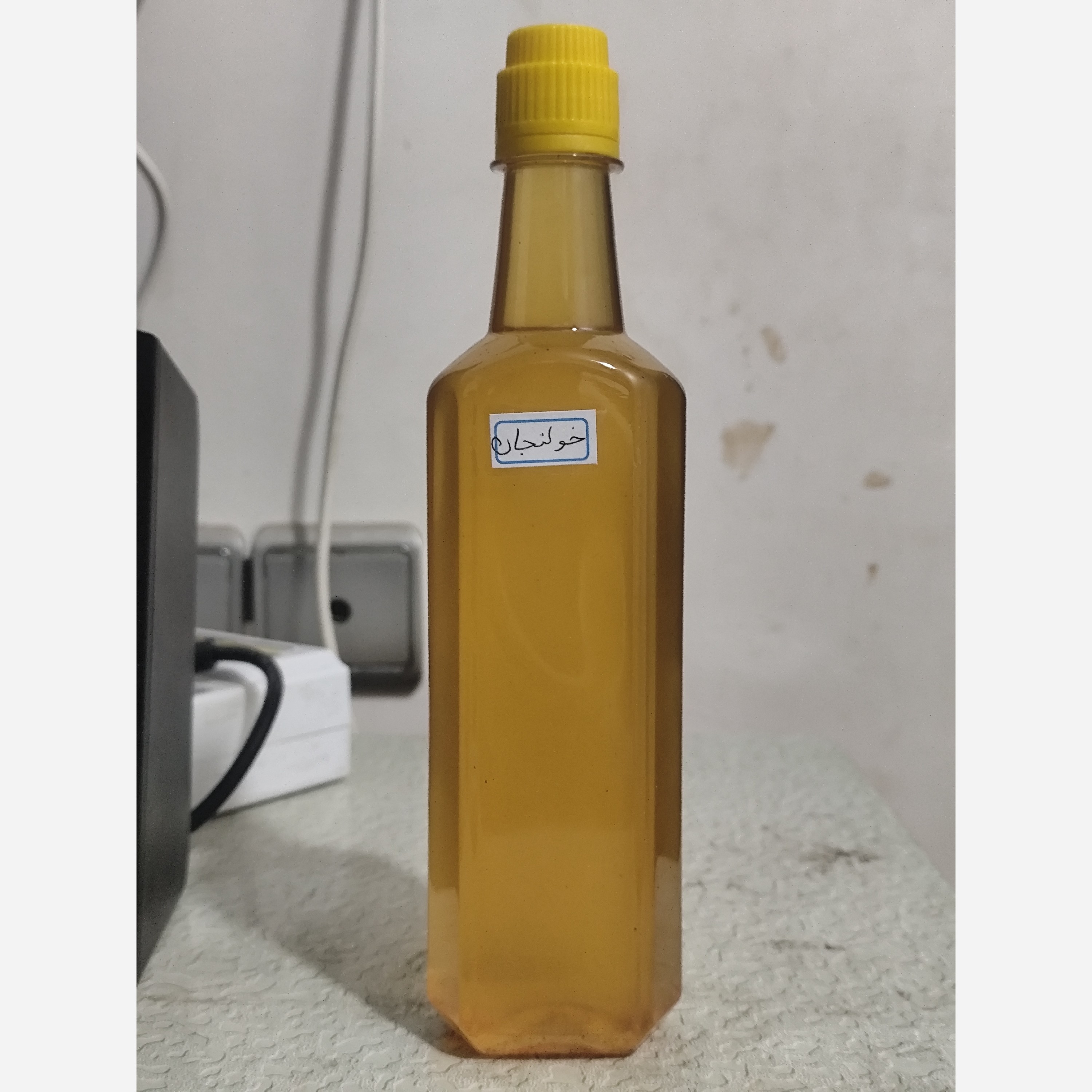 روغن خولنجان اصل و خالص نیم لیتری (پر شدن صورت کمردرد سیاتیک گردن درد دست و پا درد گرفتگی عضلات)