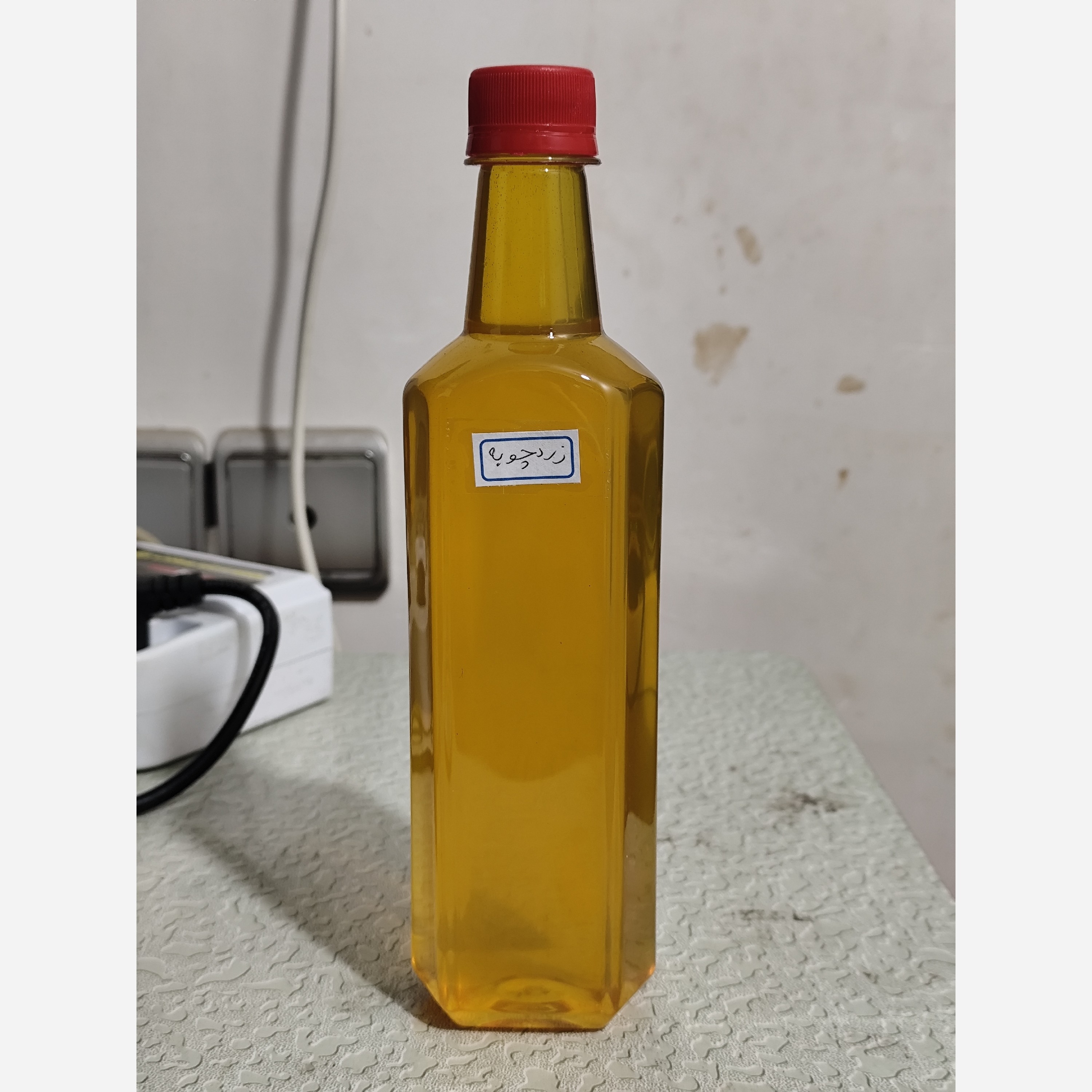 روغن زردچوبه خوراکی اصل و خالص نیم لیتری عمده