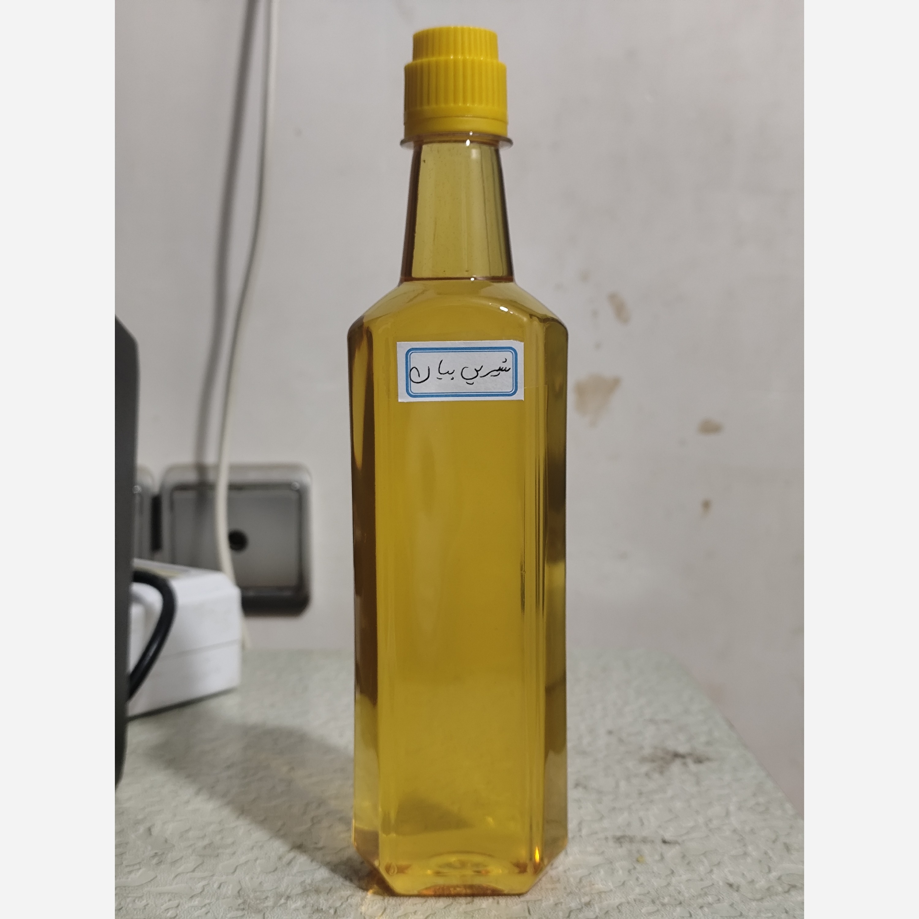 روغن شیرین بیان خوراکی اصل و خالص نیم لیتری عمده