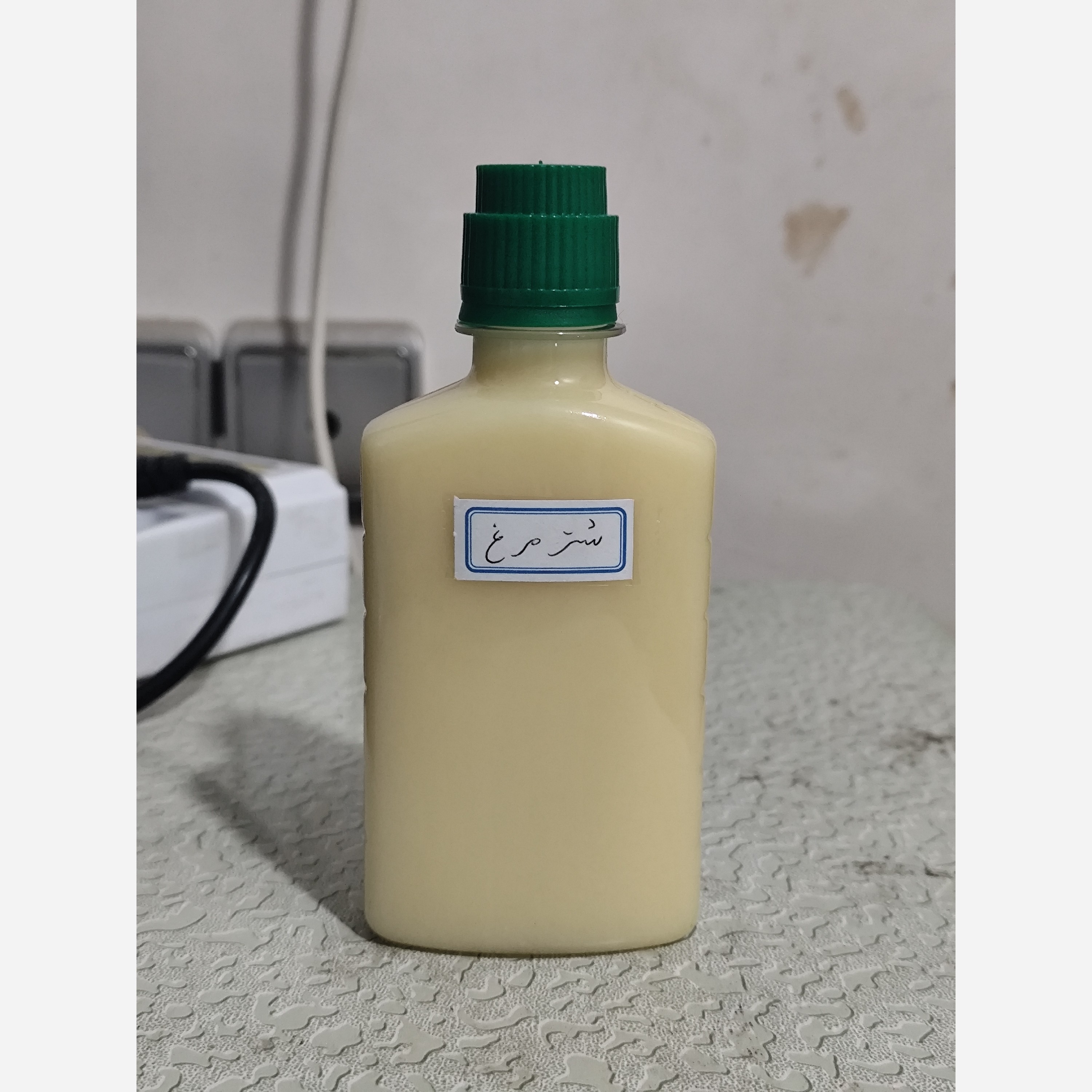 روغن شترمرغ ربع لیتری اصل (موثر در گرفتگی عضلات و تسکین دهنده