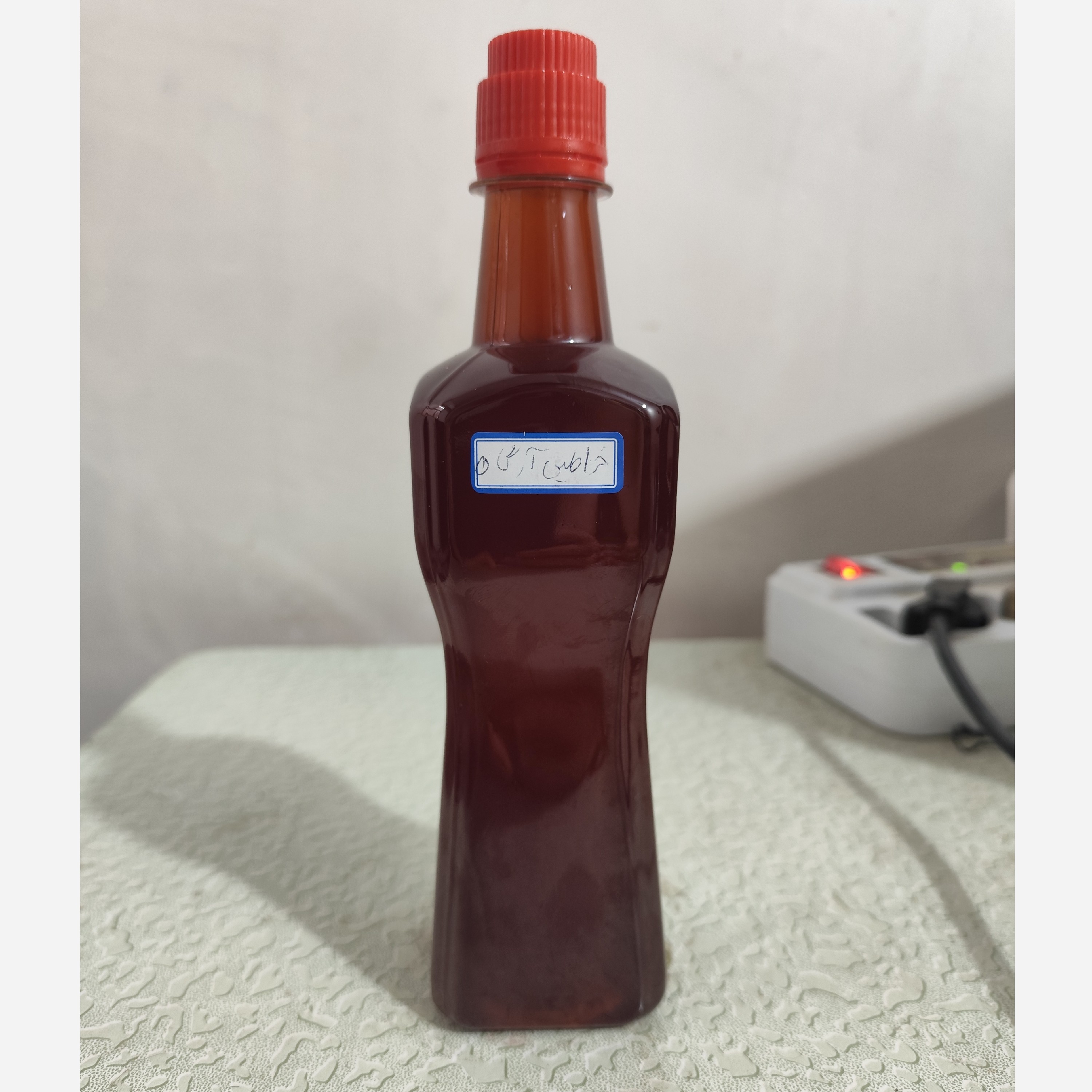 روغن خراطین سیاه پایه آرگان نیم لیتری اصل عمده