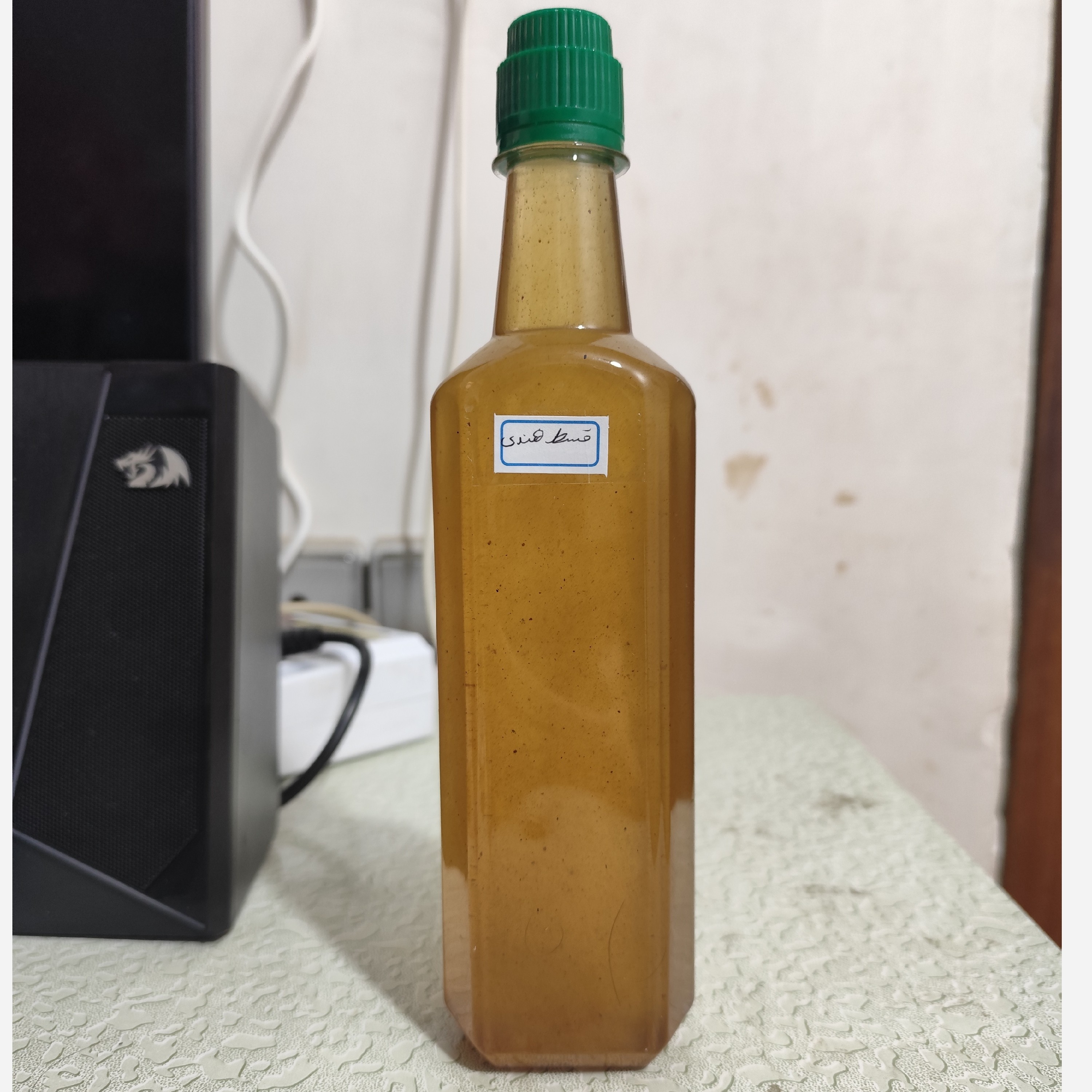 روغن قسط تلخ قسط هندی نیم لیتری اصل و خالص تلخ (موثر در گرفتگی عضلات و تسکین دهنده) روغن کوشنه