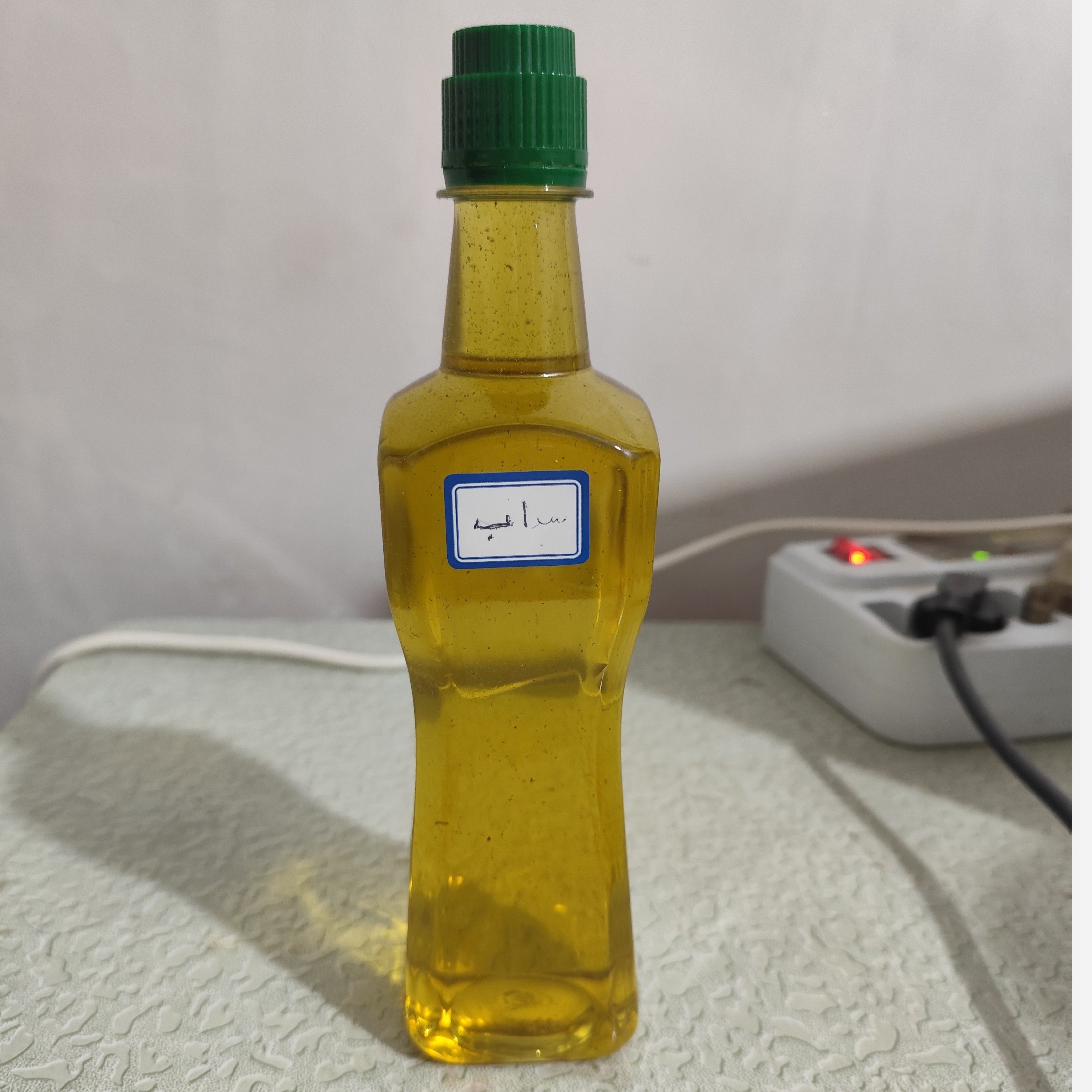 روغن سداب نیم لیتری اصل (دردگوش صدای گوش وزوز گوش گوش درد شستشوی گوش تقویت شنوایی) روغن فیجن