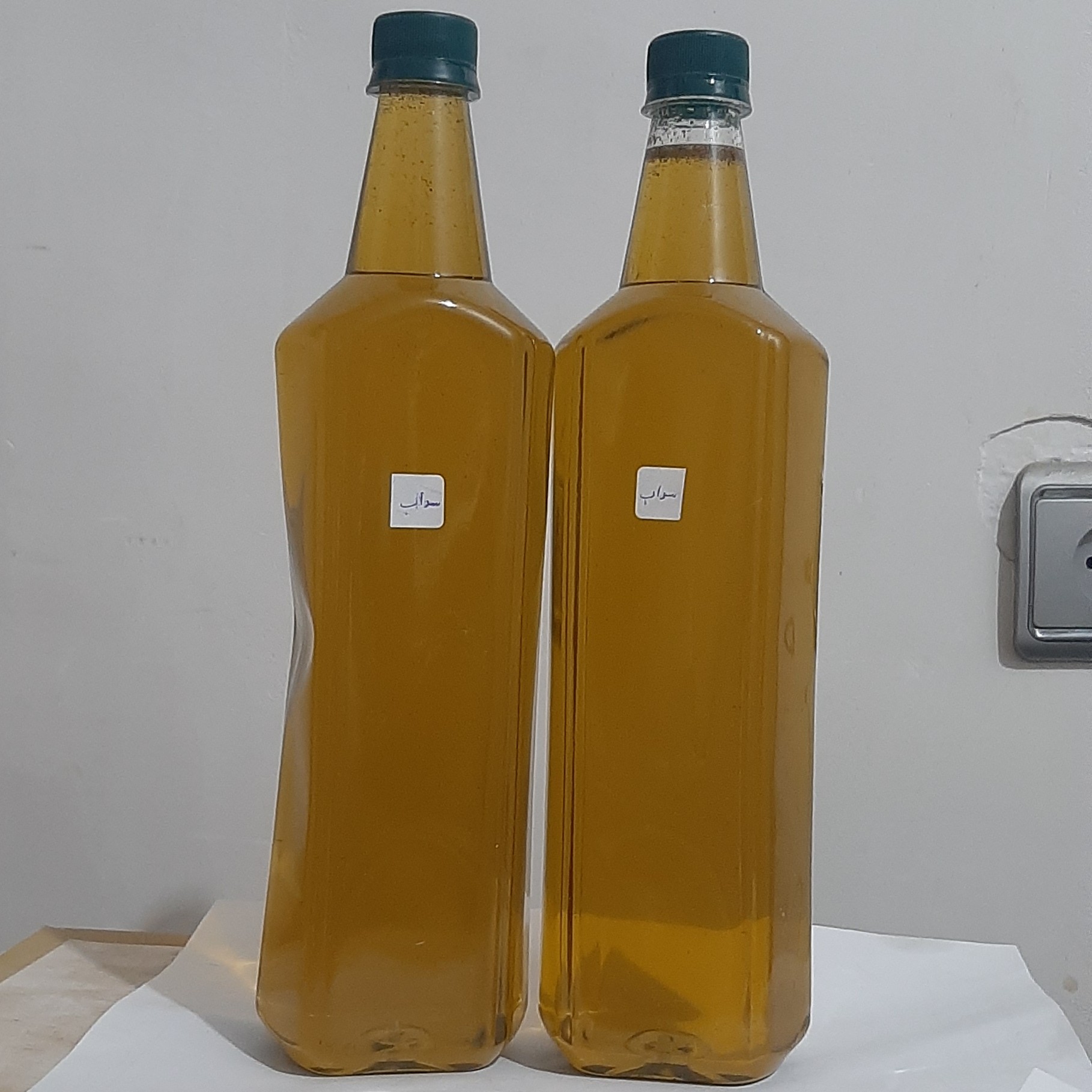 روغن سداب یک لیتری اصل (دردگوش صدای گوش وزوز گوش گوش درد شستشوی گوش تقویت شنوایی) روغن فیجن