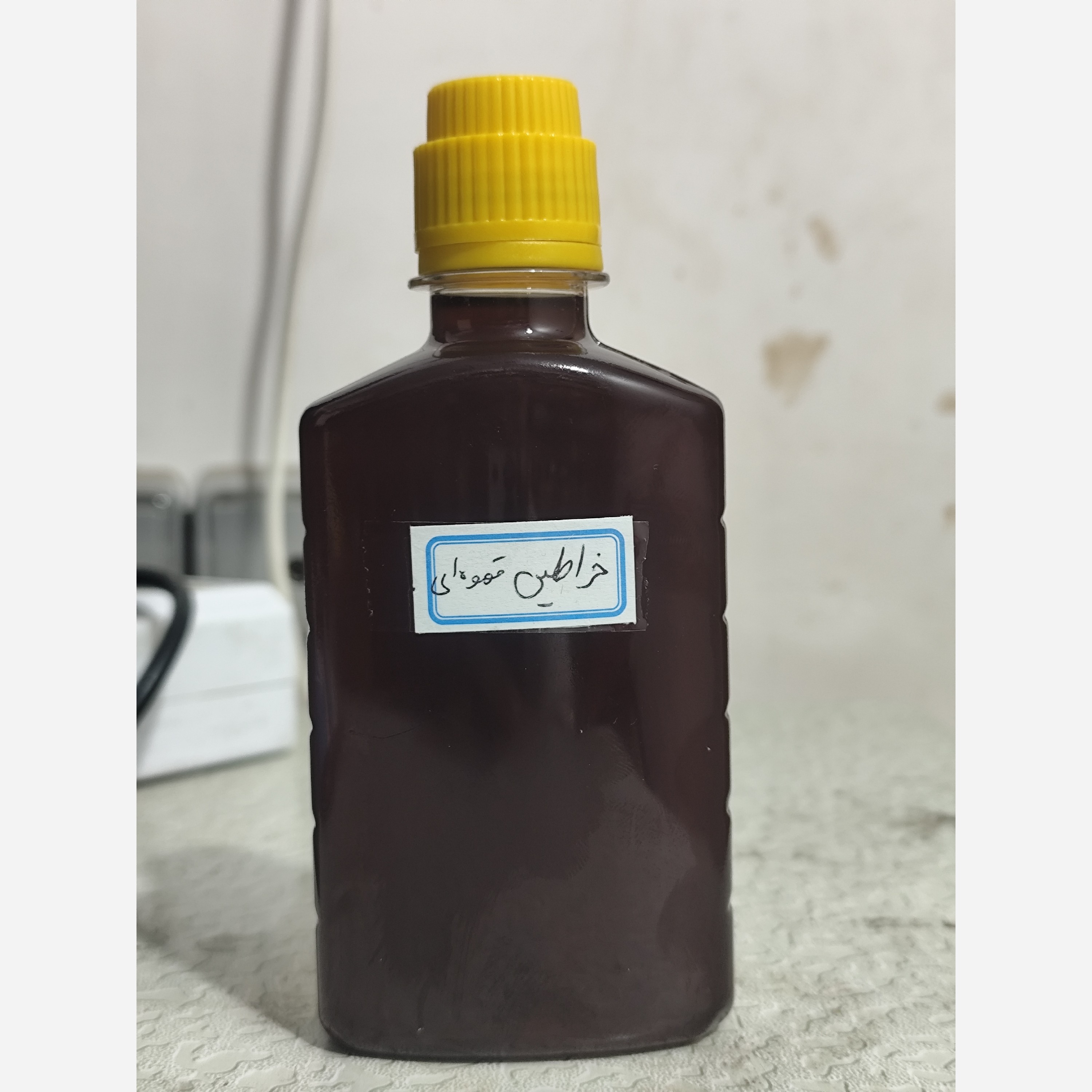 روغن خراطین اصل ایرانی قهوه ای ربع لیتری