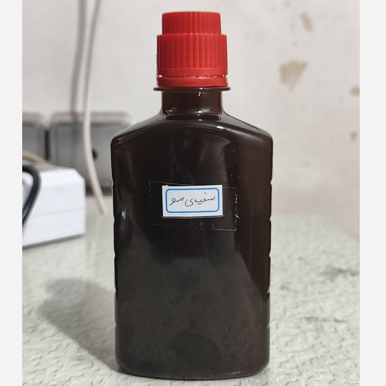 روغن ترکیبی رفع سفیدی مو ربع لیتری (سفیدی مو سفیدی ریش و سبیل ضدسفیدی مو رنگ مو سیاه کننده مو)