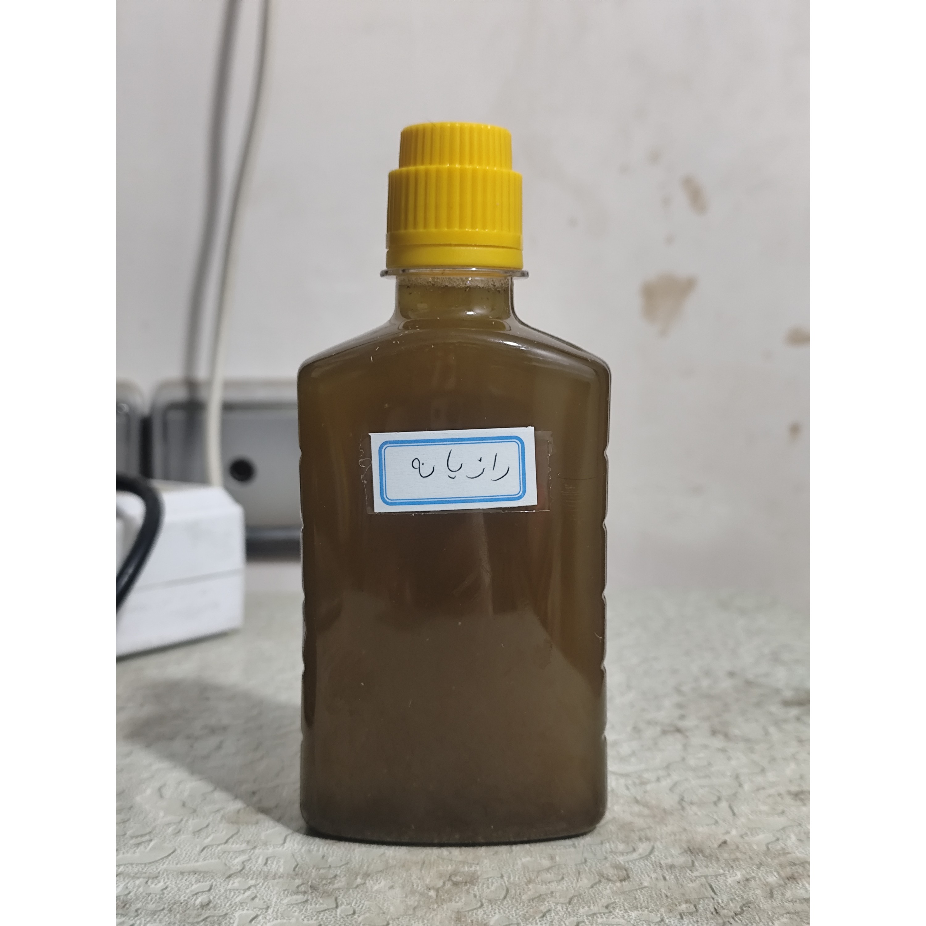 روغن رازیانه بنماری ربع لیتری اصل (رفع موهای زائد روشن کننده نرم کننده پوست موهای زاید موبر)