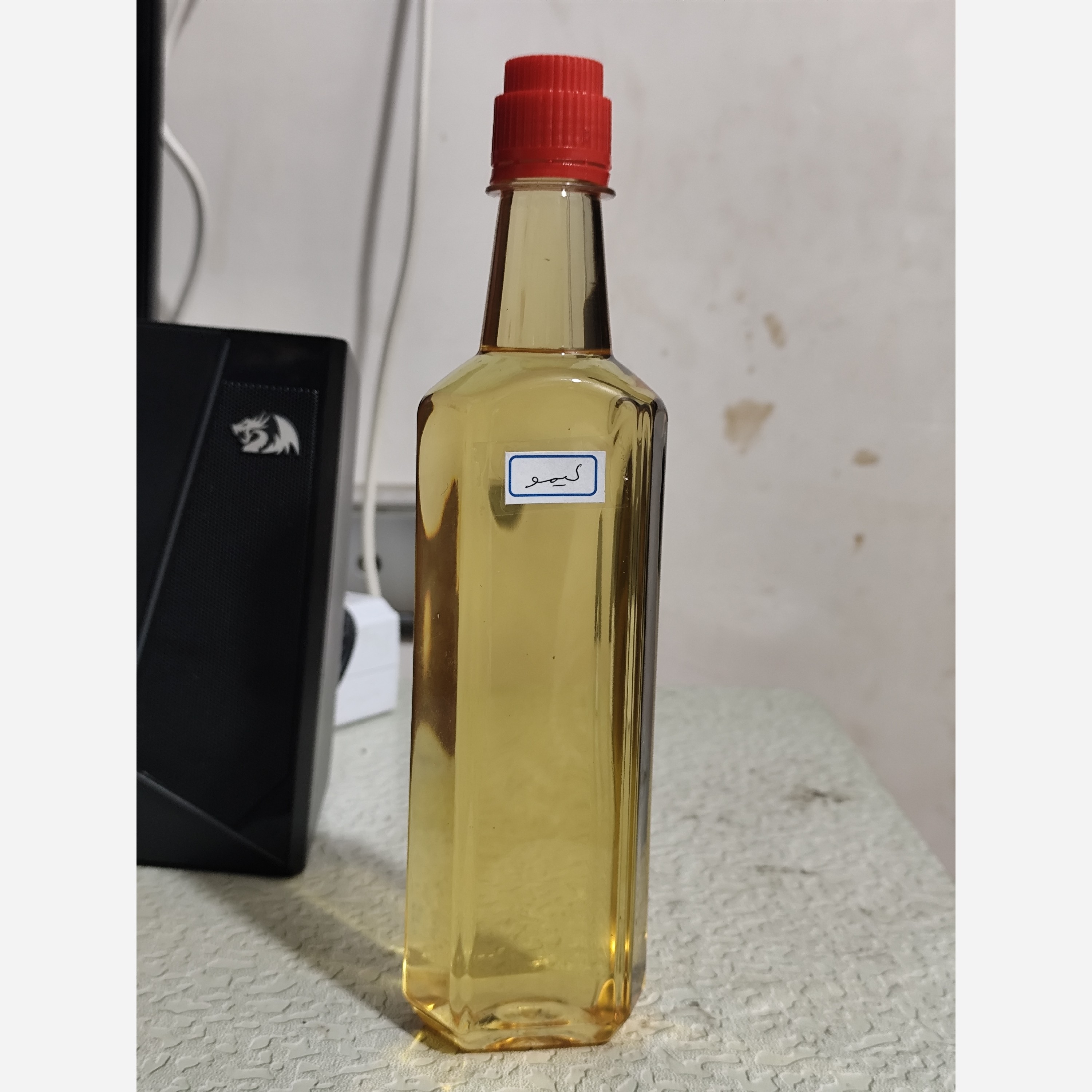 روغن لیمو اصل نیم لیتری (روشن کننده پوست - لک صورت - جوش صورت - آکنه - لک بارداری - ضدلک)