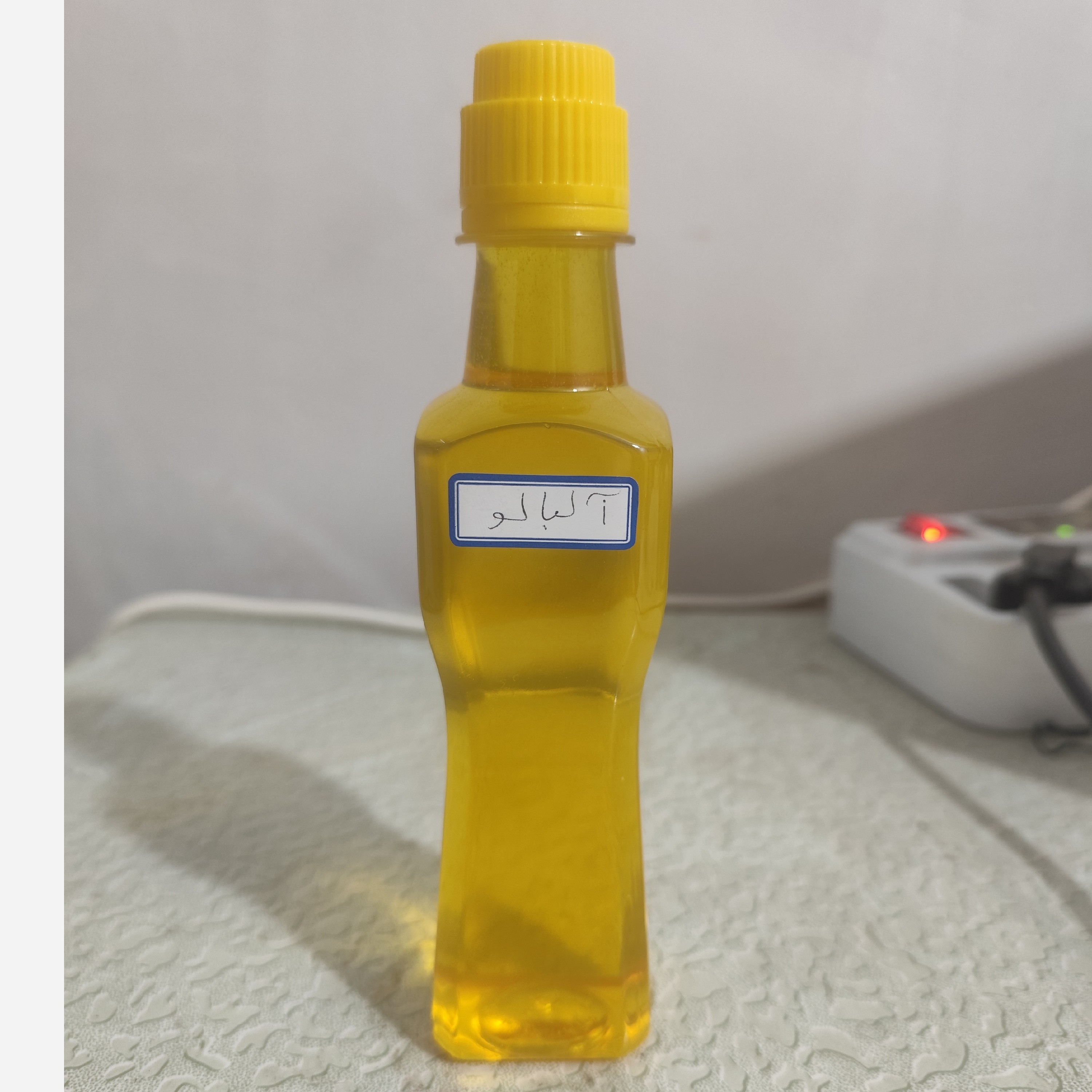روغن هسته آلبالو ربع لیتری اصل