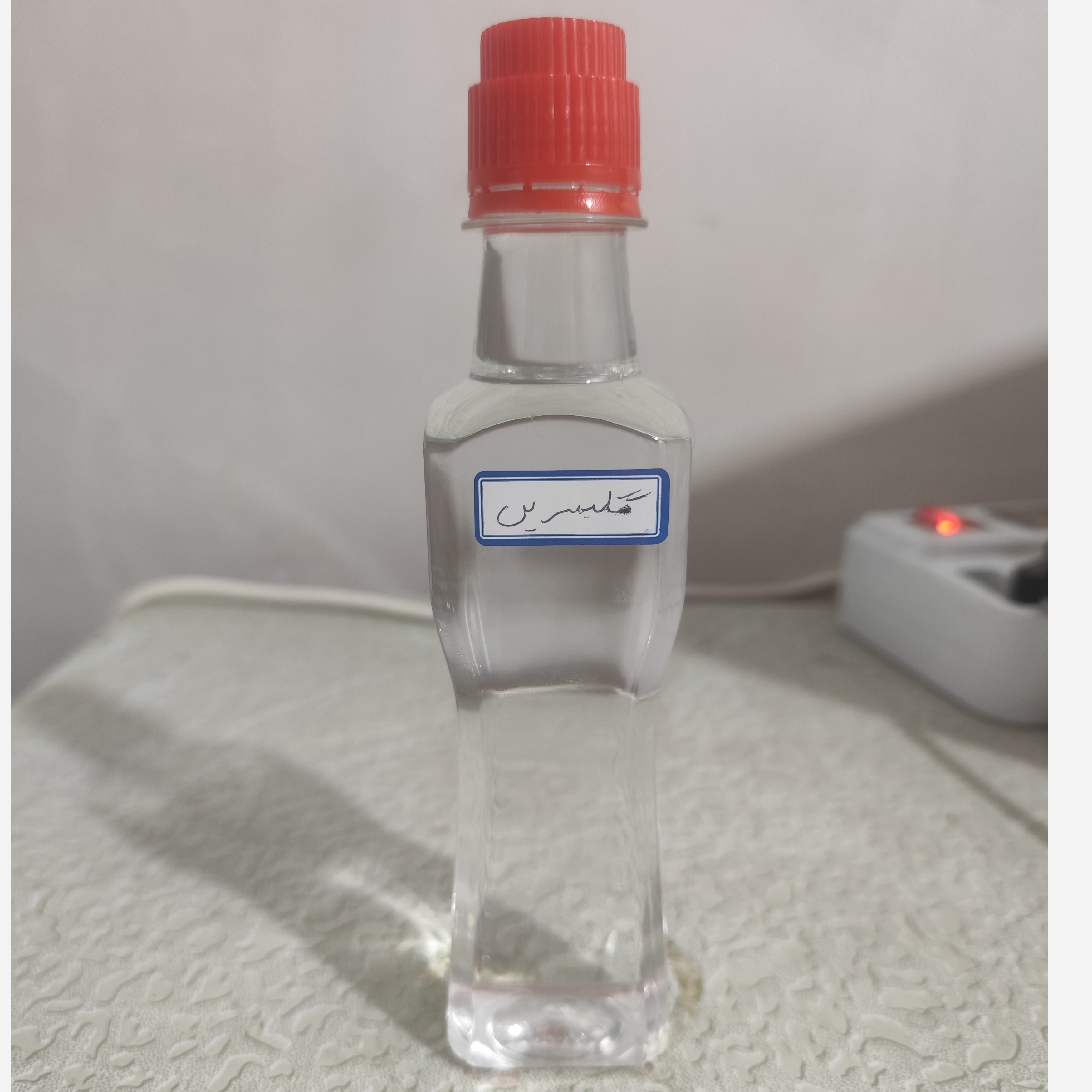 روغن گلیسیرین گلیسرین خوراکی (پر شدن صورت گونه چین و چروک شیر پاک کن نرمی و لطافت پوست خشکی لب ترک پاشنه پا) ربع لیتری