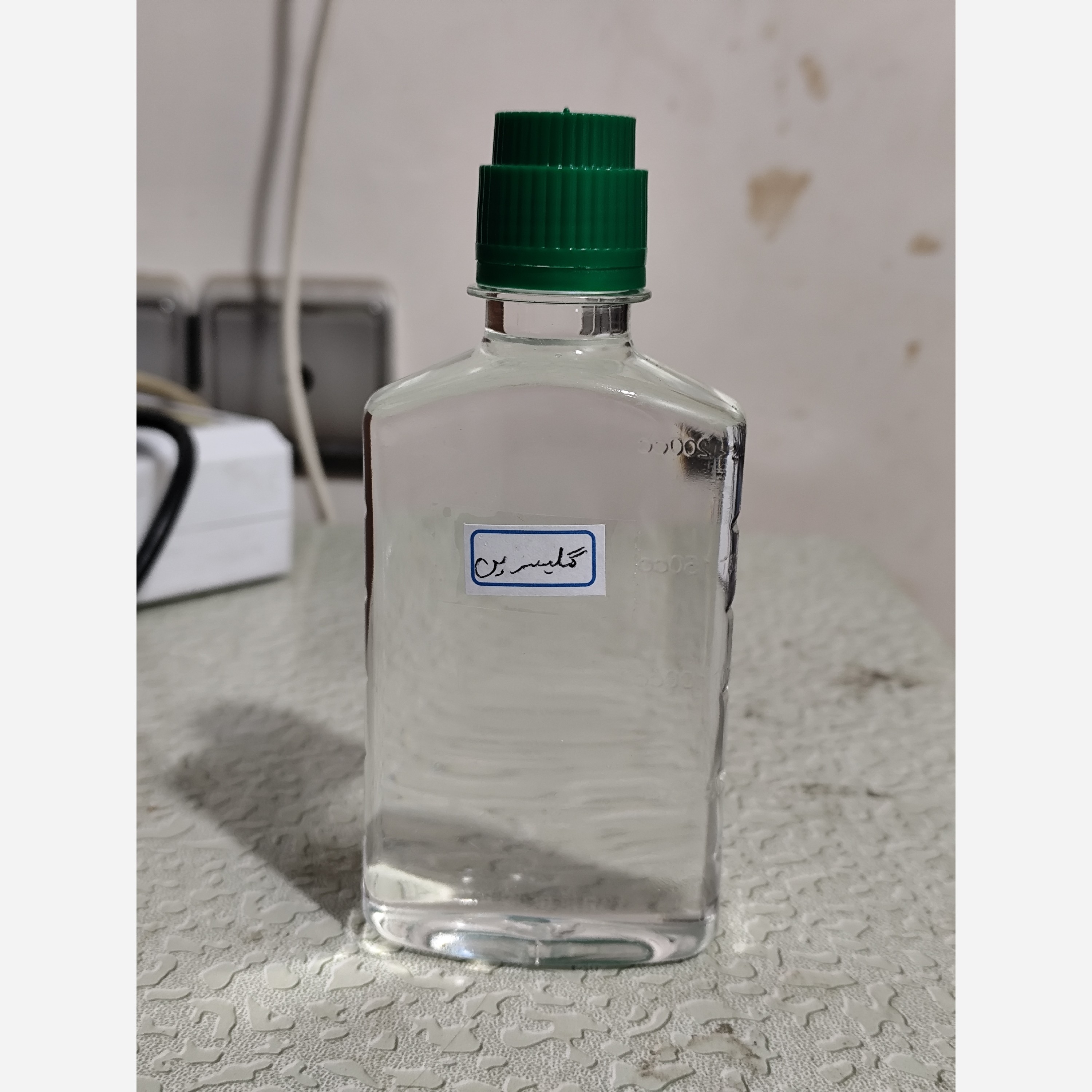 روغن گلیسیرین گلیسرین خوراکی (پر شدن صورت گونه چین و چروک شیر پاک کن نرمی و لطافت پوست خشکی لب ترک پاشنه پا) ربع لیتری