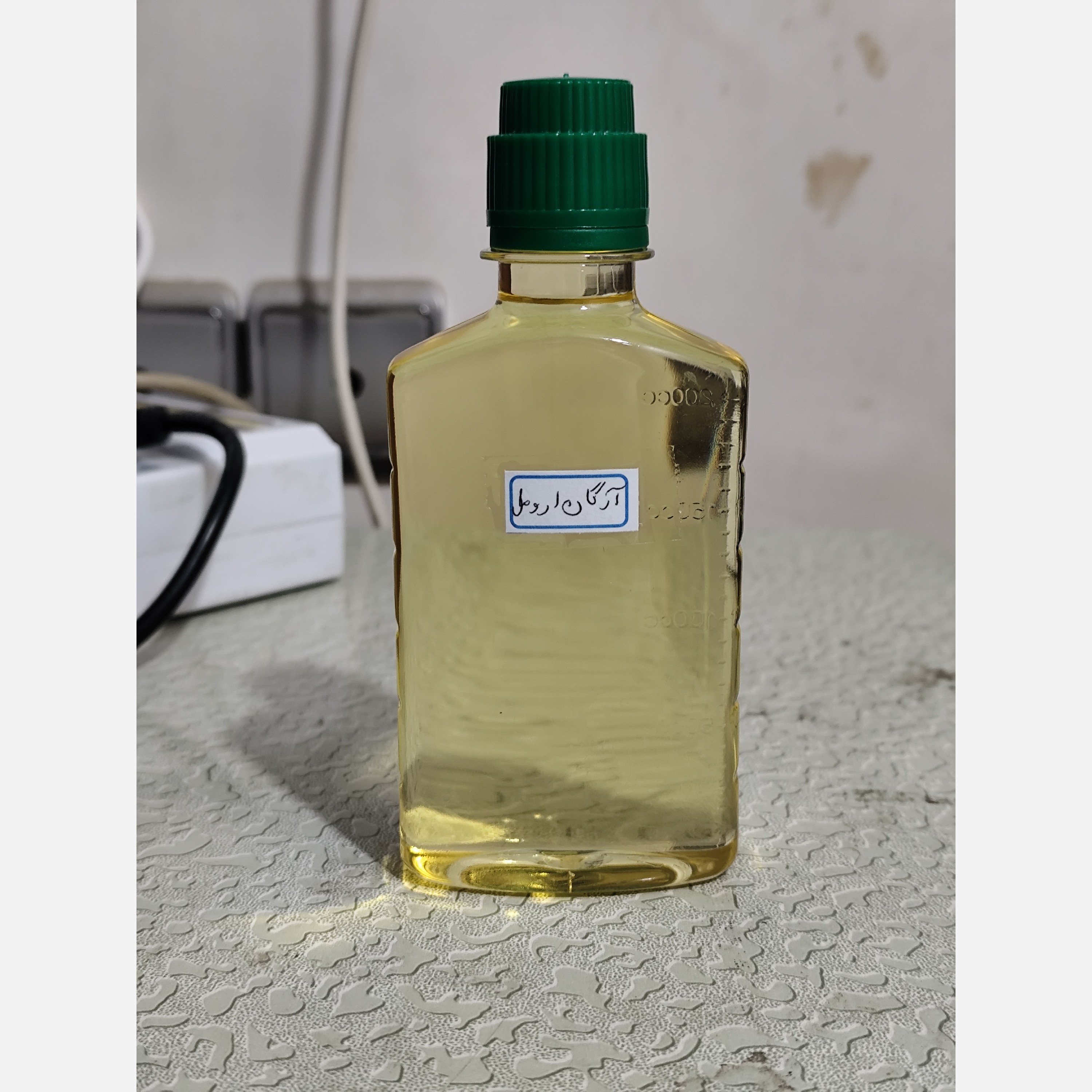 روغن آرگان ارومل معطر اصل ربع لیتری اصل و عمده (بهبود چین و چروک ضدریزش مو رشد مو جوش صورت)