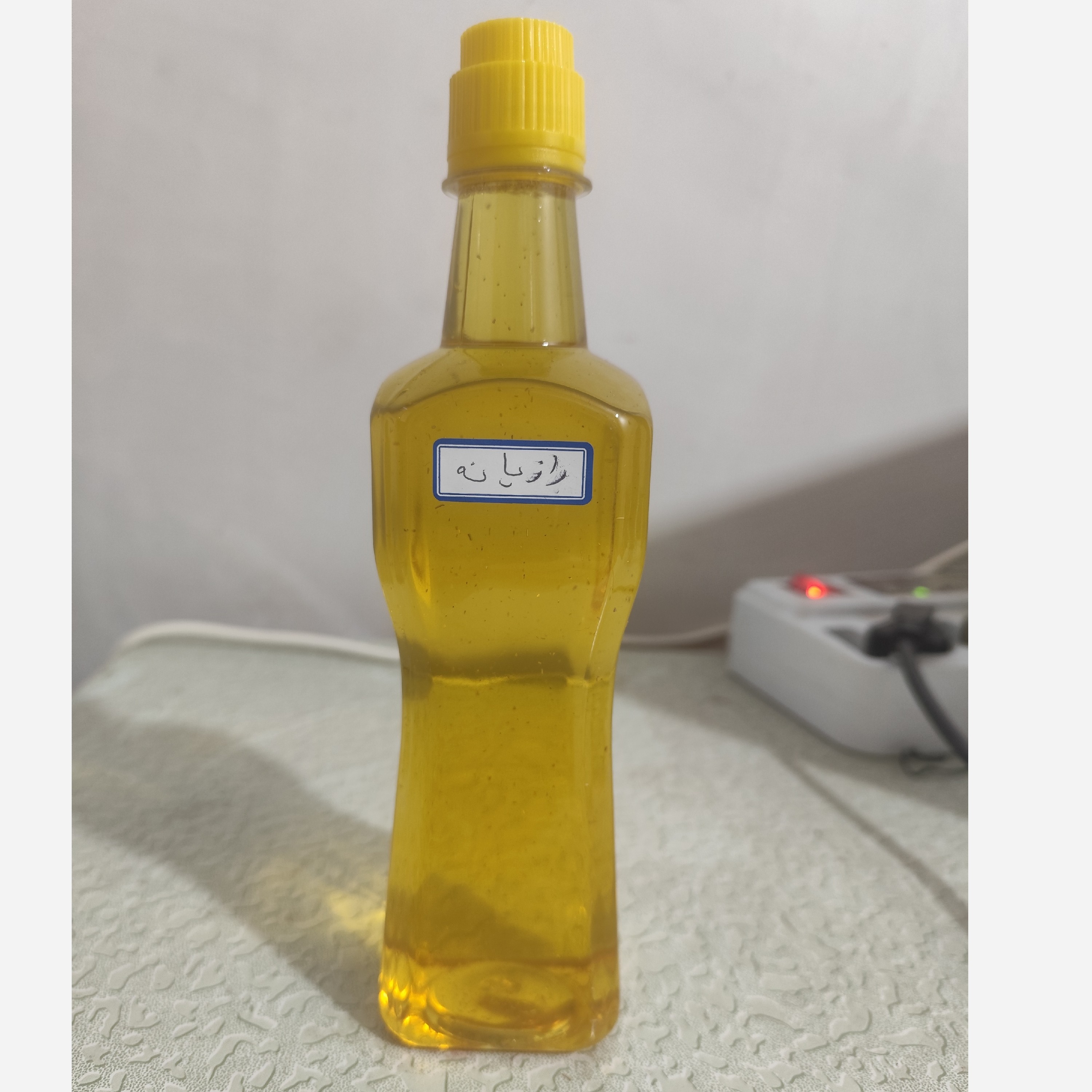 روغن رازیانه بنماری نیم لیتری اصل (رفع موهای زائد روشن کننده نرم کننده پوست موهای زاید موبر)