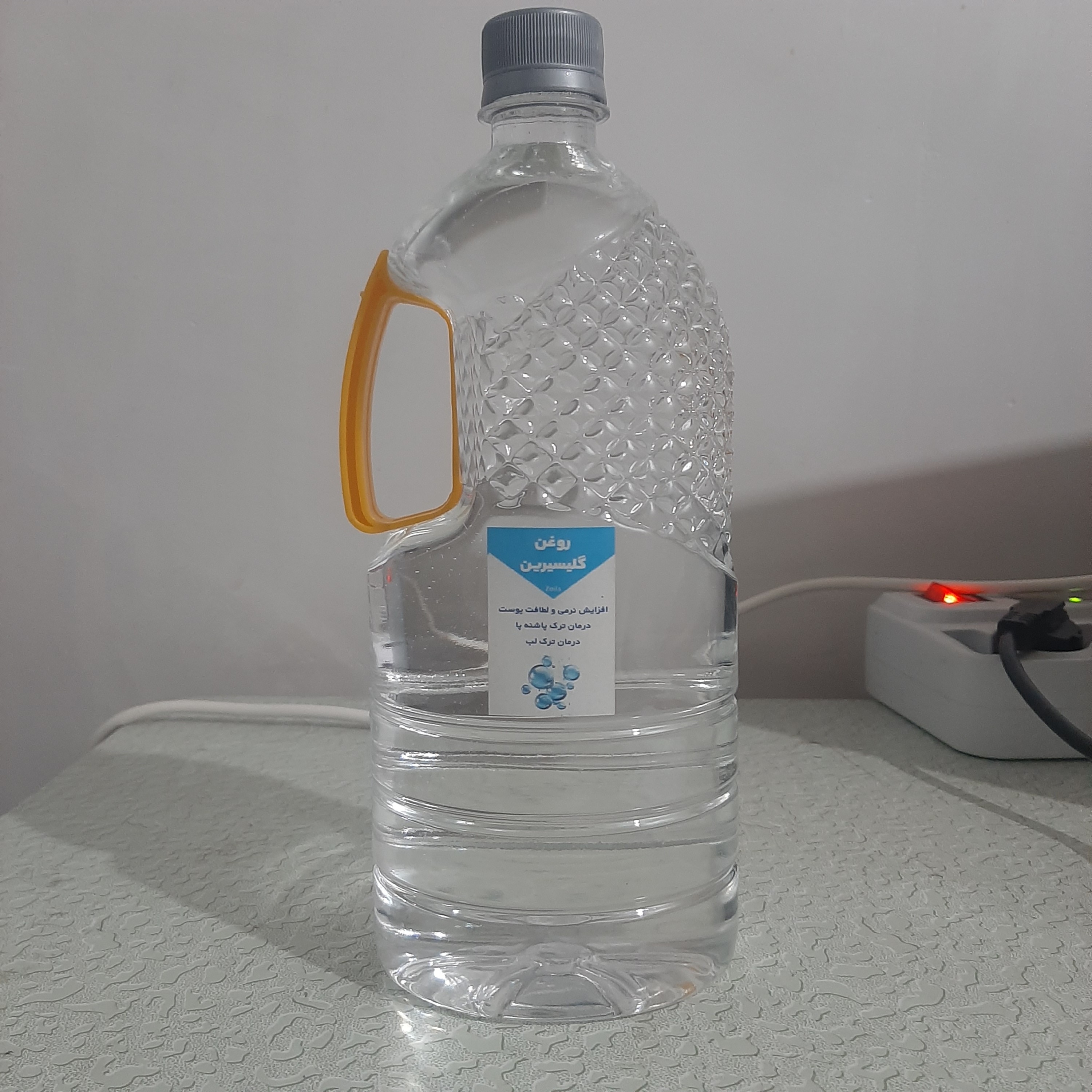 روغن گلیسیرین گلیسرین خوراکی غلیظ(پر شدن صورت گونه چین و چروک شیر پاک کن نرمی و لطافت پوست خشکی لب ترک پاشنه یک لیتری