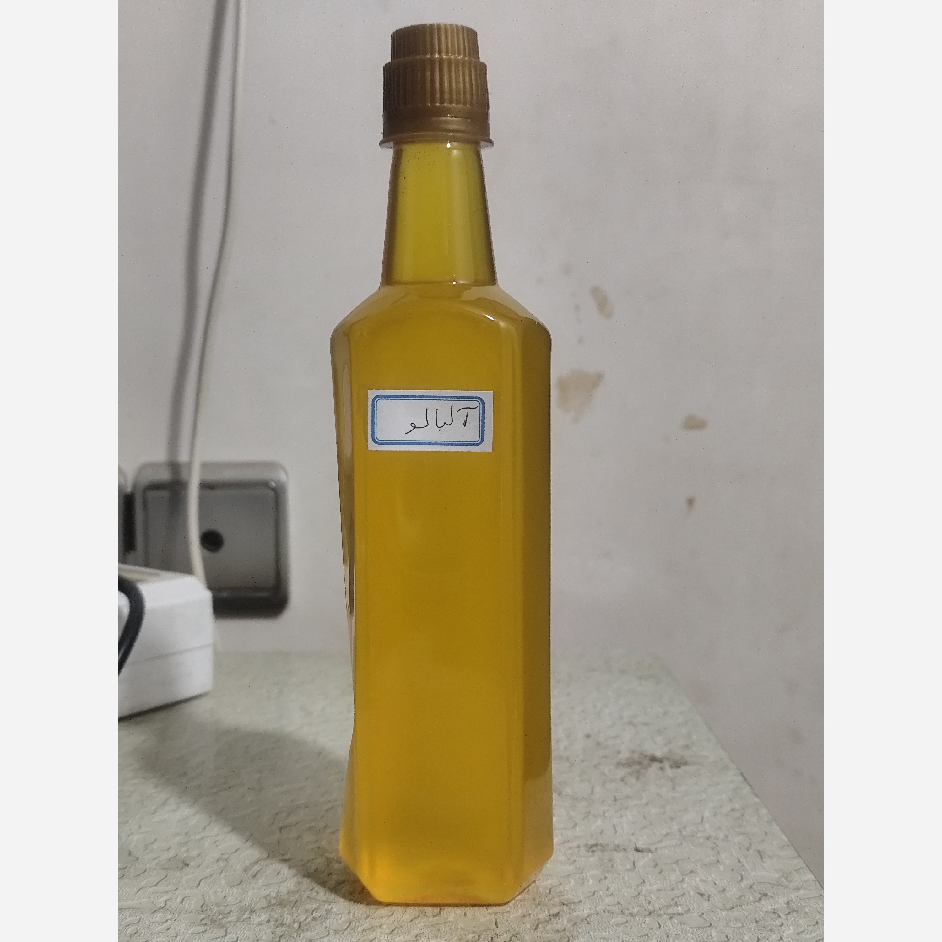 روغن هسته آلبالو نیم لیتری اصل عمده