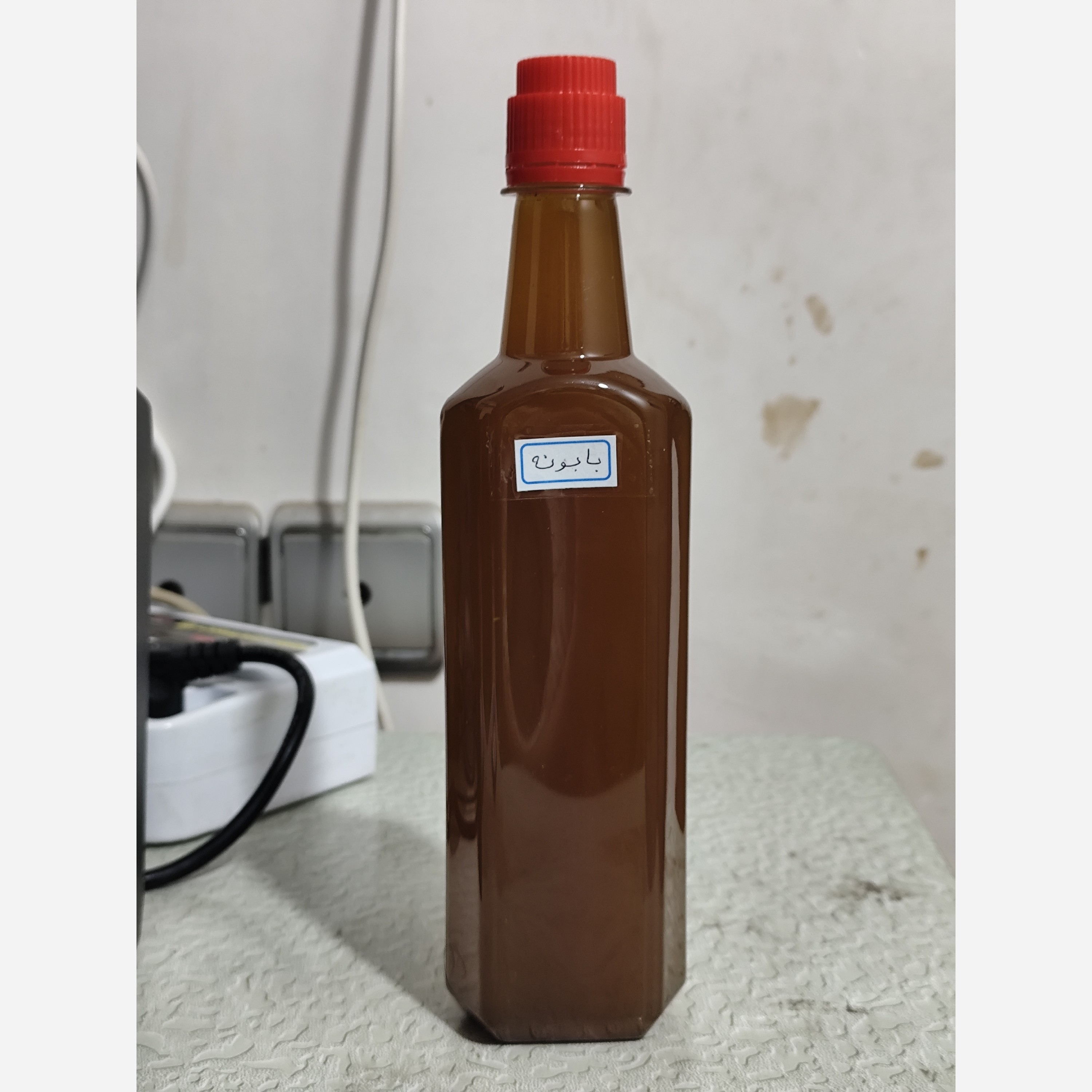 روغن بابونه نیم لیتری اصل (روشن کننده رنگ مو نرم کننده مو جوش صورت شوره مو خشکی مو تقویت مو آبرسان مو آفتاب سوختگی آکنه