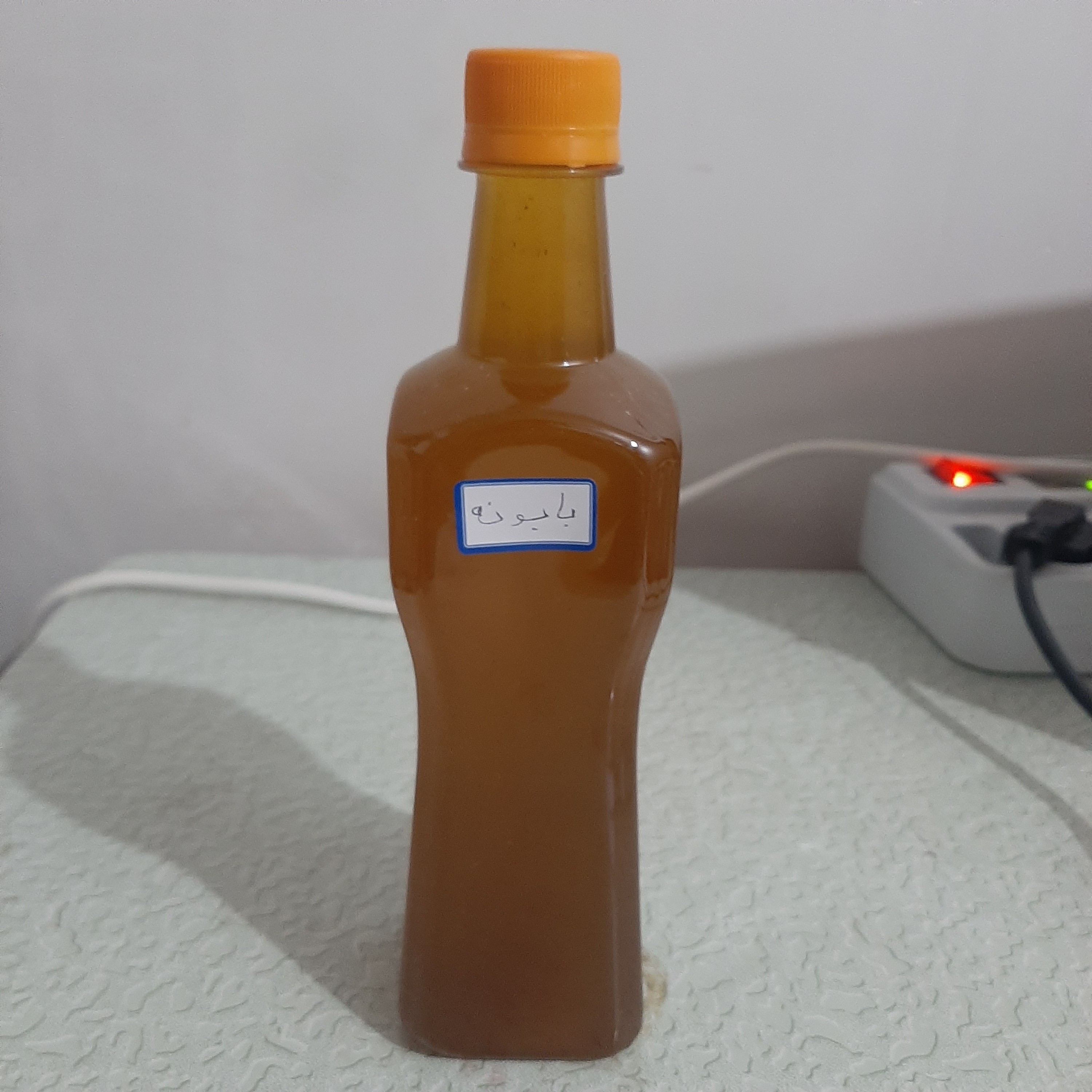 روغن بابونه نیم لیتری اصل (روشن کننده رنگ مو نرم کننده مو جوش صورت شوره مو خشکی مو تقویت مو آبرسان مو آفتاب سوختگی آکنه
