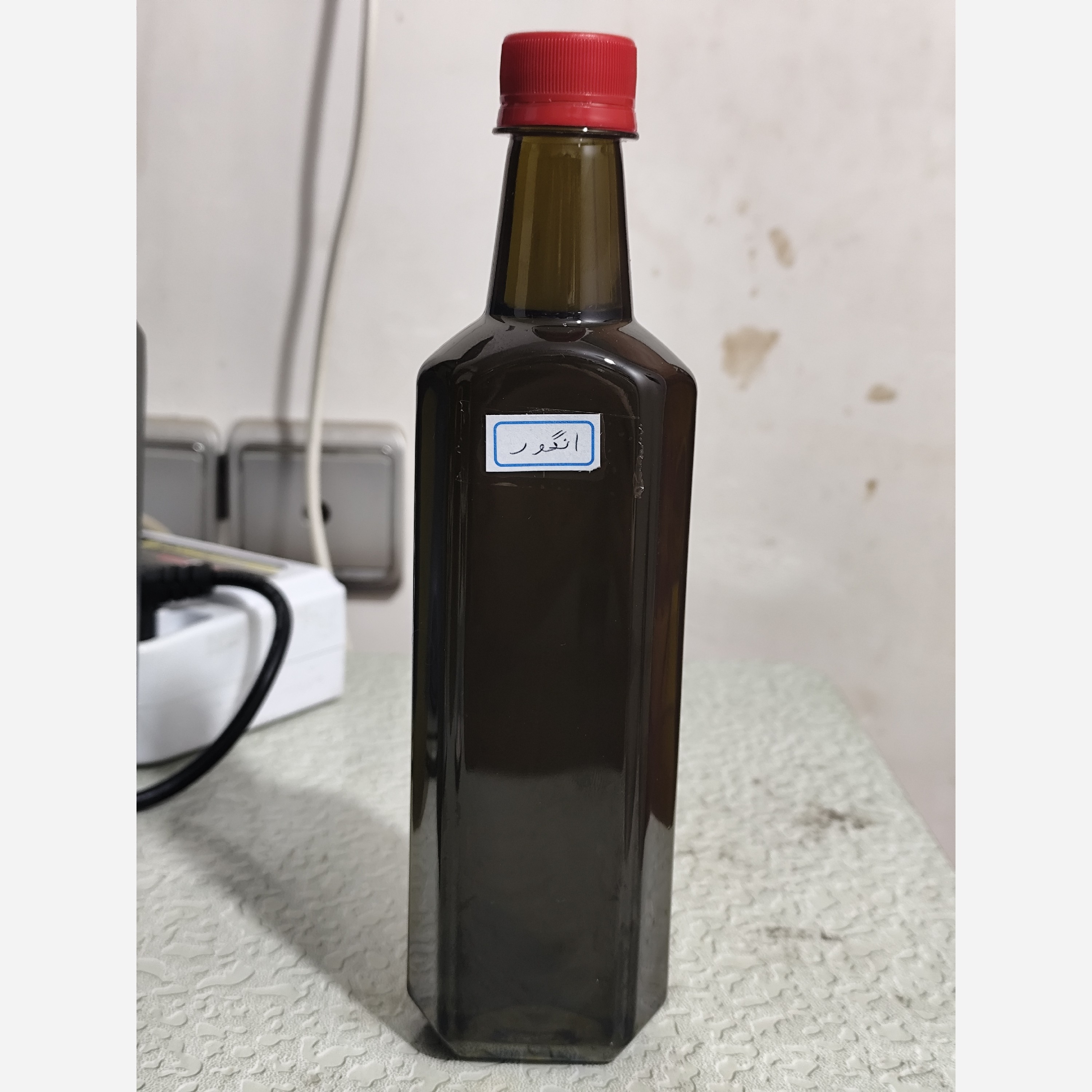 روغن هسته انگور اصل نیم لیتری (سفت کننده پوست سیاهی دور چشم منافذ باز پوست) خالص سی سی