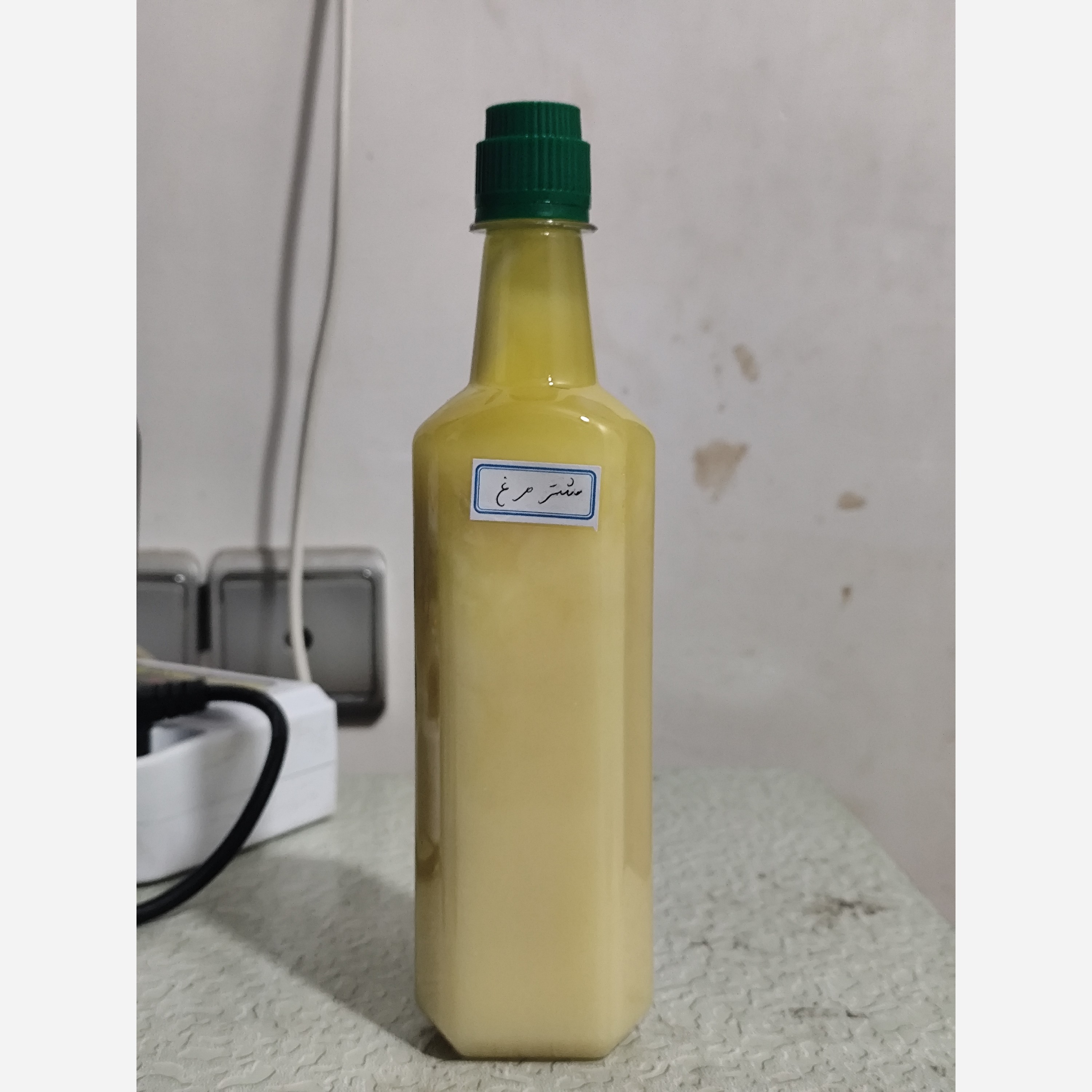 روغن شترمرغ نیم لیتری اصل (موثر در گرفتگی عضلات و تسکین دهنده