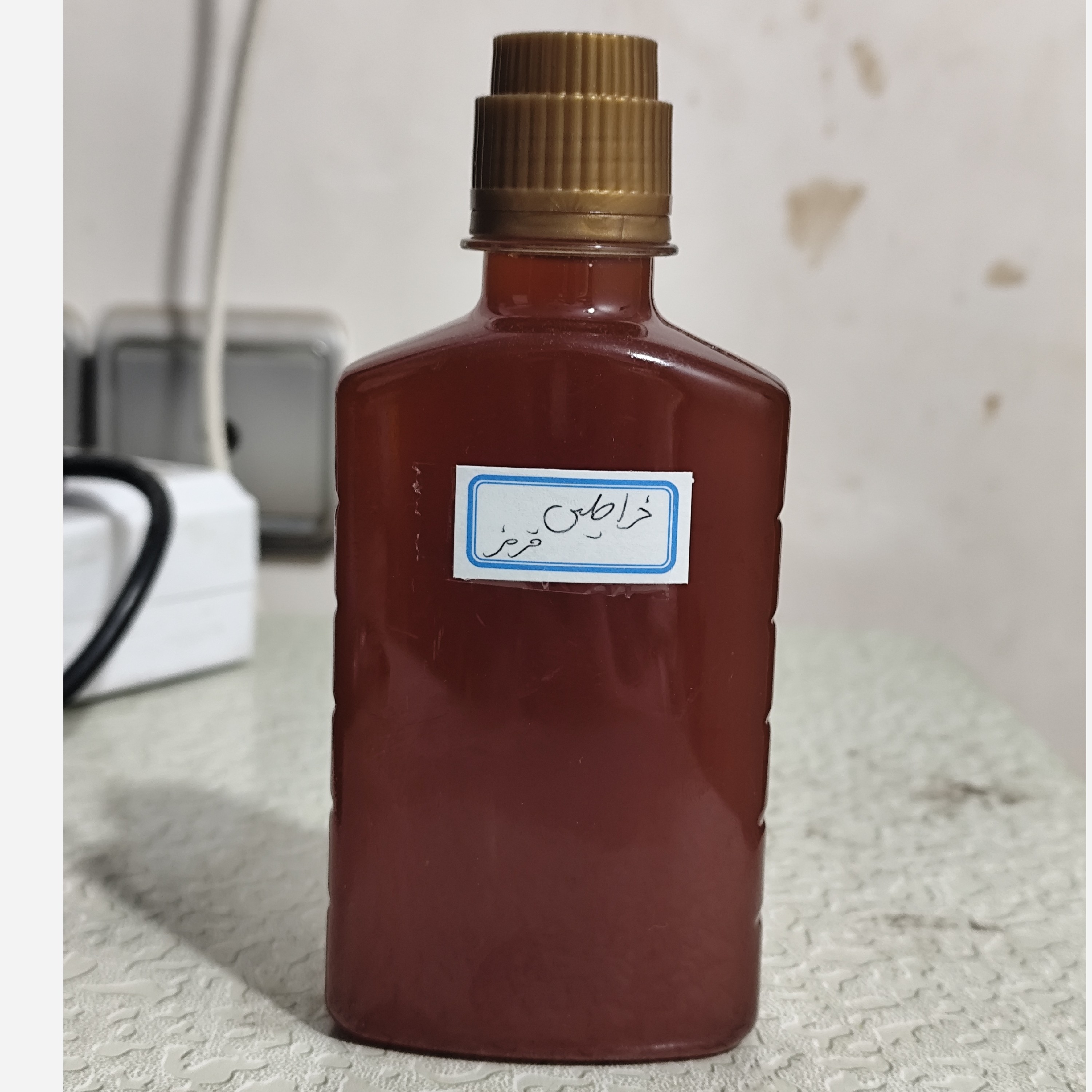 روغن خراطین قرمز هندی ربع لیتری