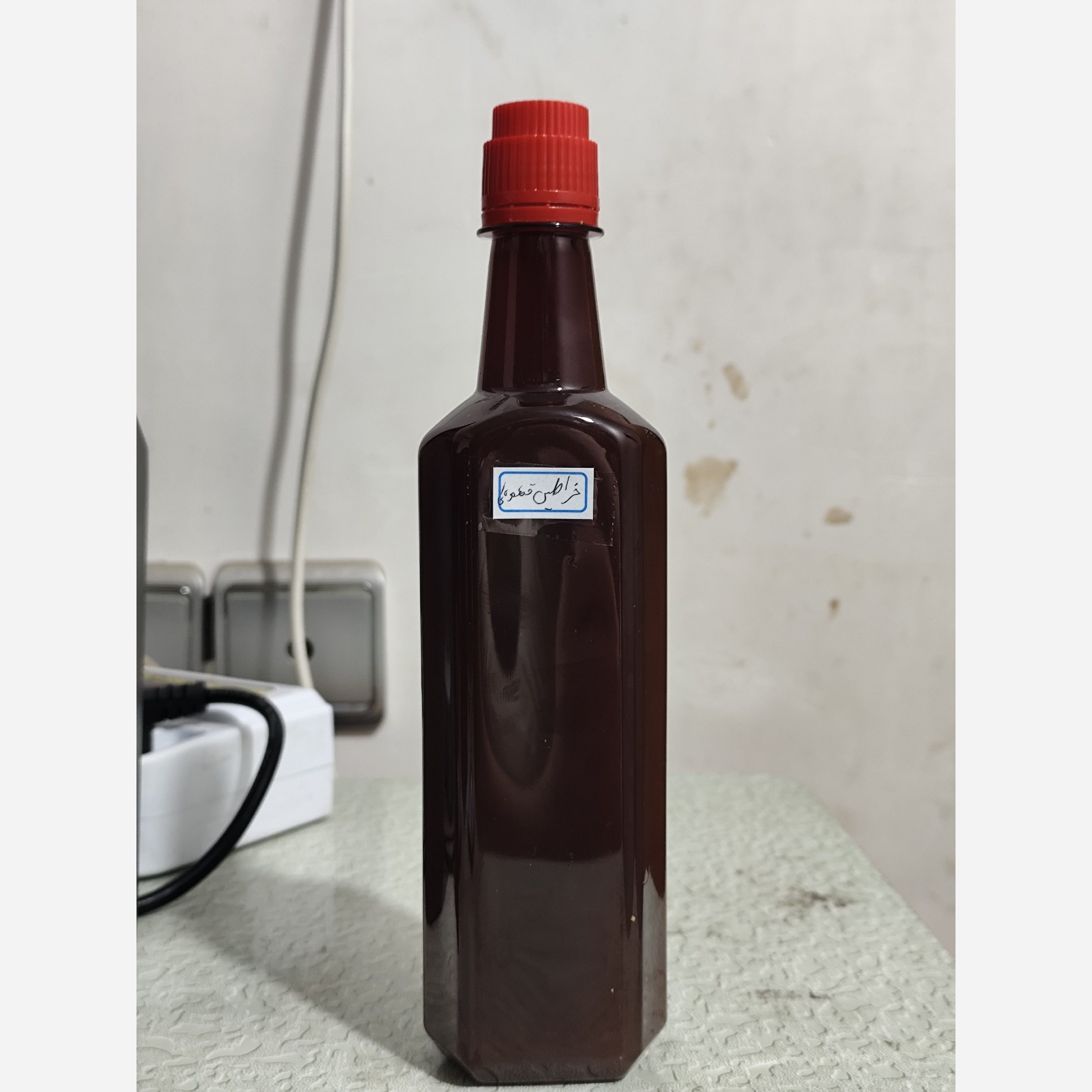 روغن خراطین اصل ایرانی قهوه ای نیم لیتری
