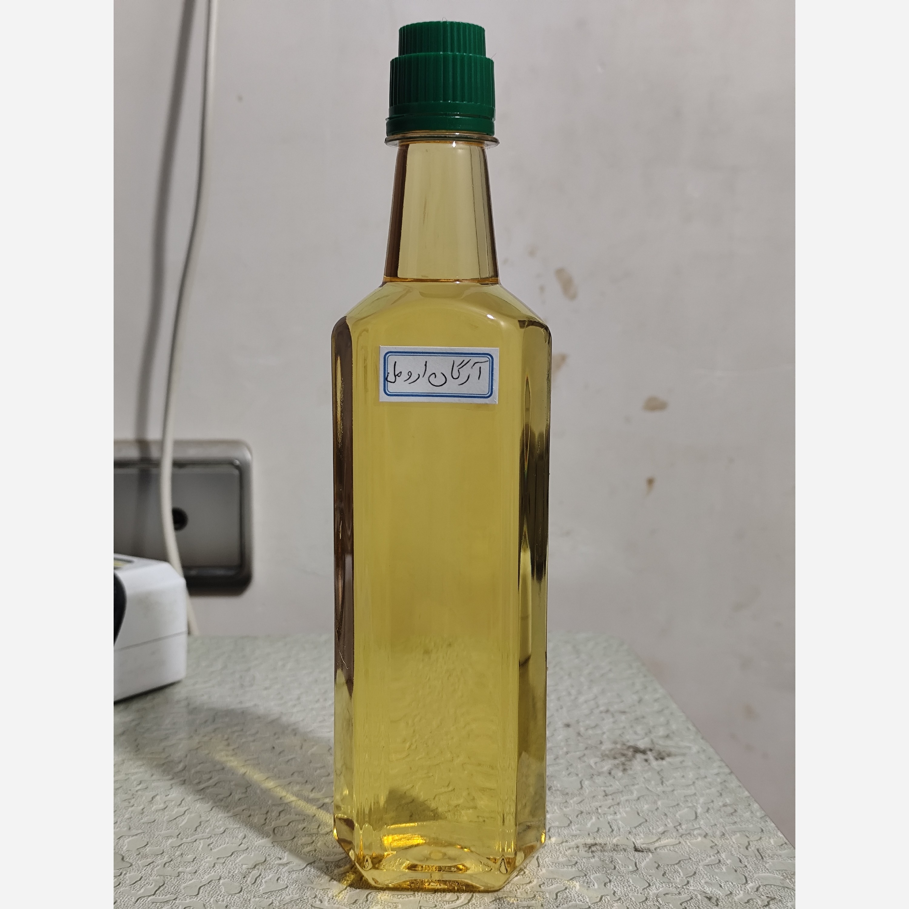 روغن آرگان معطر اصل  ارومل نیم لیتری (بهبود چین و چروک ضدریزش مو رشد مو جوش صورت)