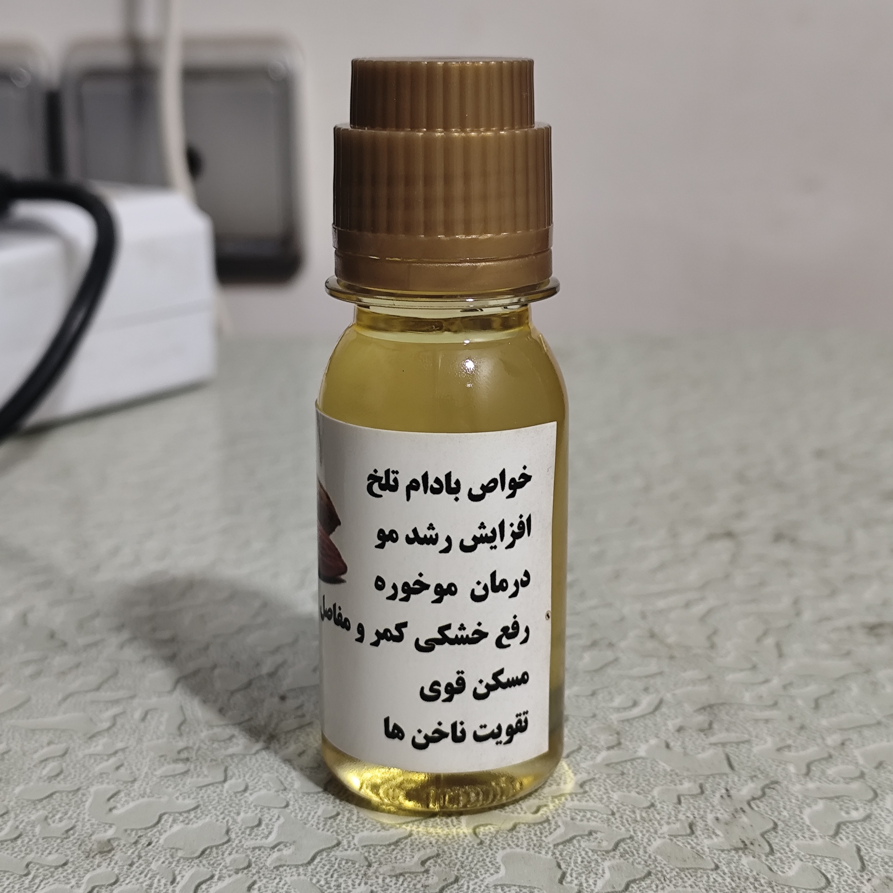 روغن بادام تلخ 60 سی سی درجه یک (لک صورت چین و چروک اگزما آبرسان پوست شوره مو تقویت ابرو)